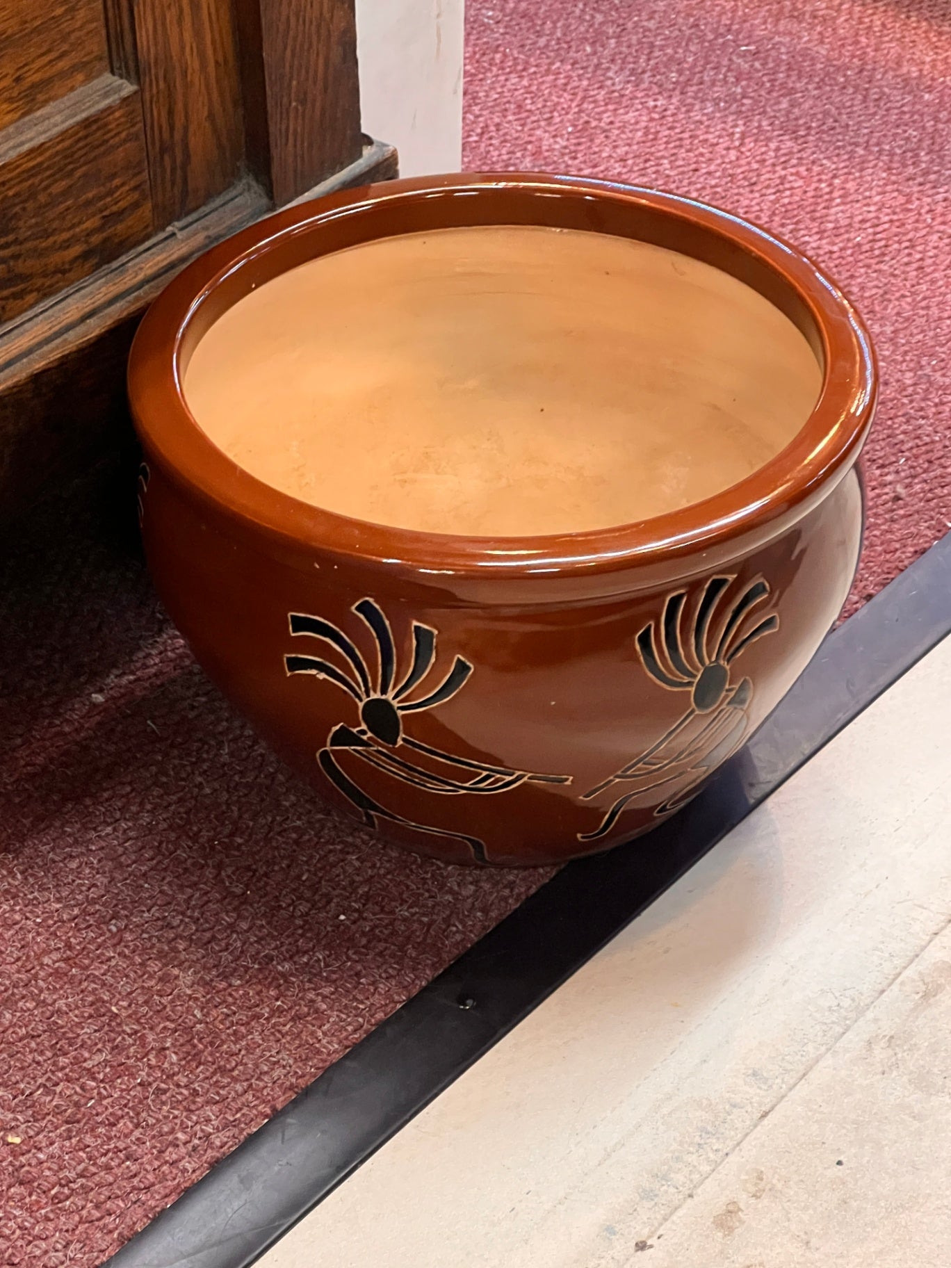 Southwestern-Style Terracotta Planter with Kokopelli Design