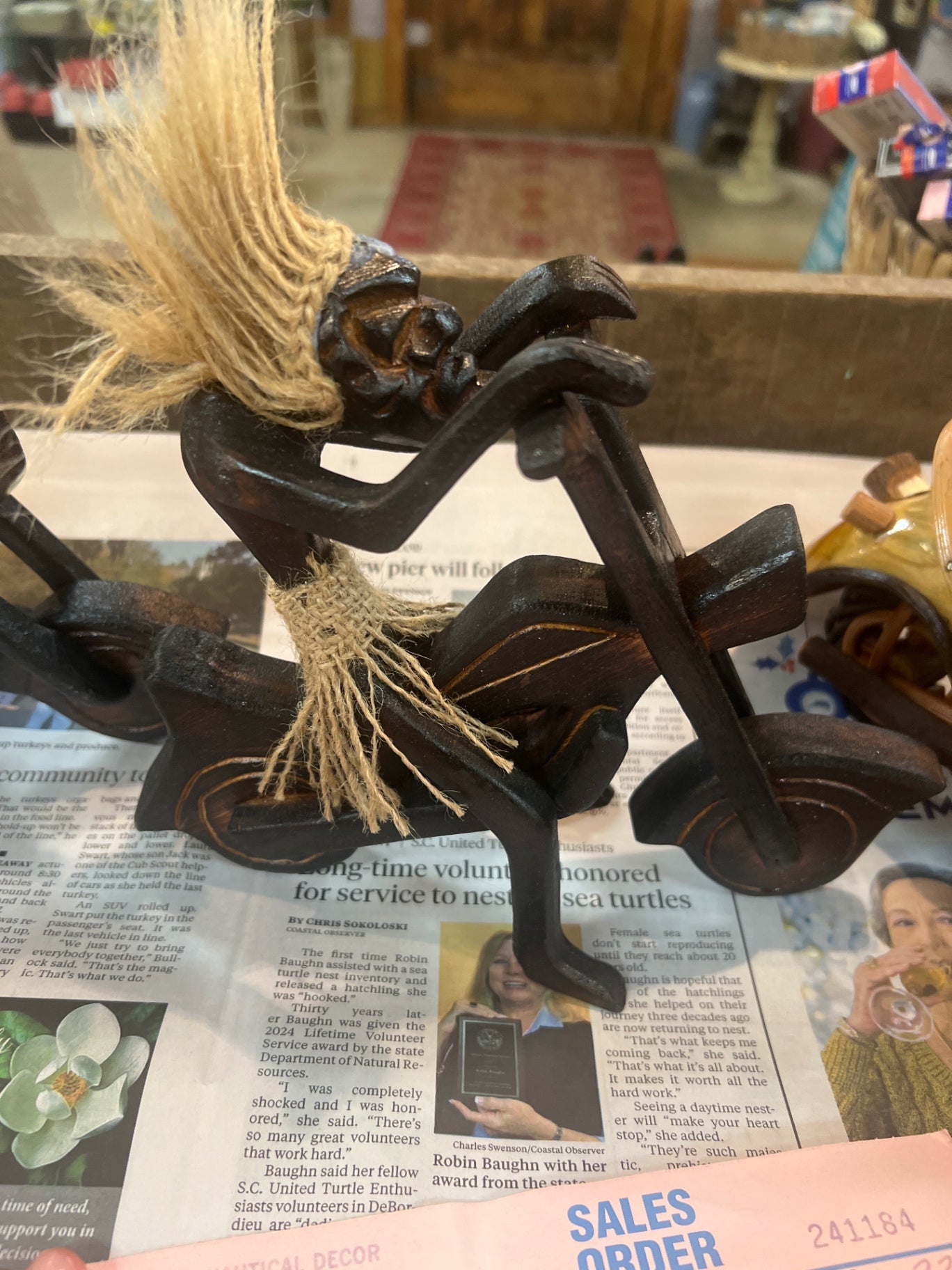 Wooden decorative sculpture Dark brown with some lighter carved details Wood