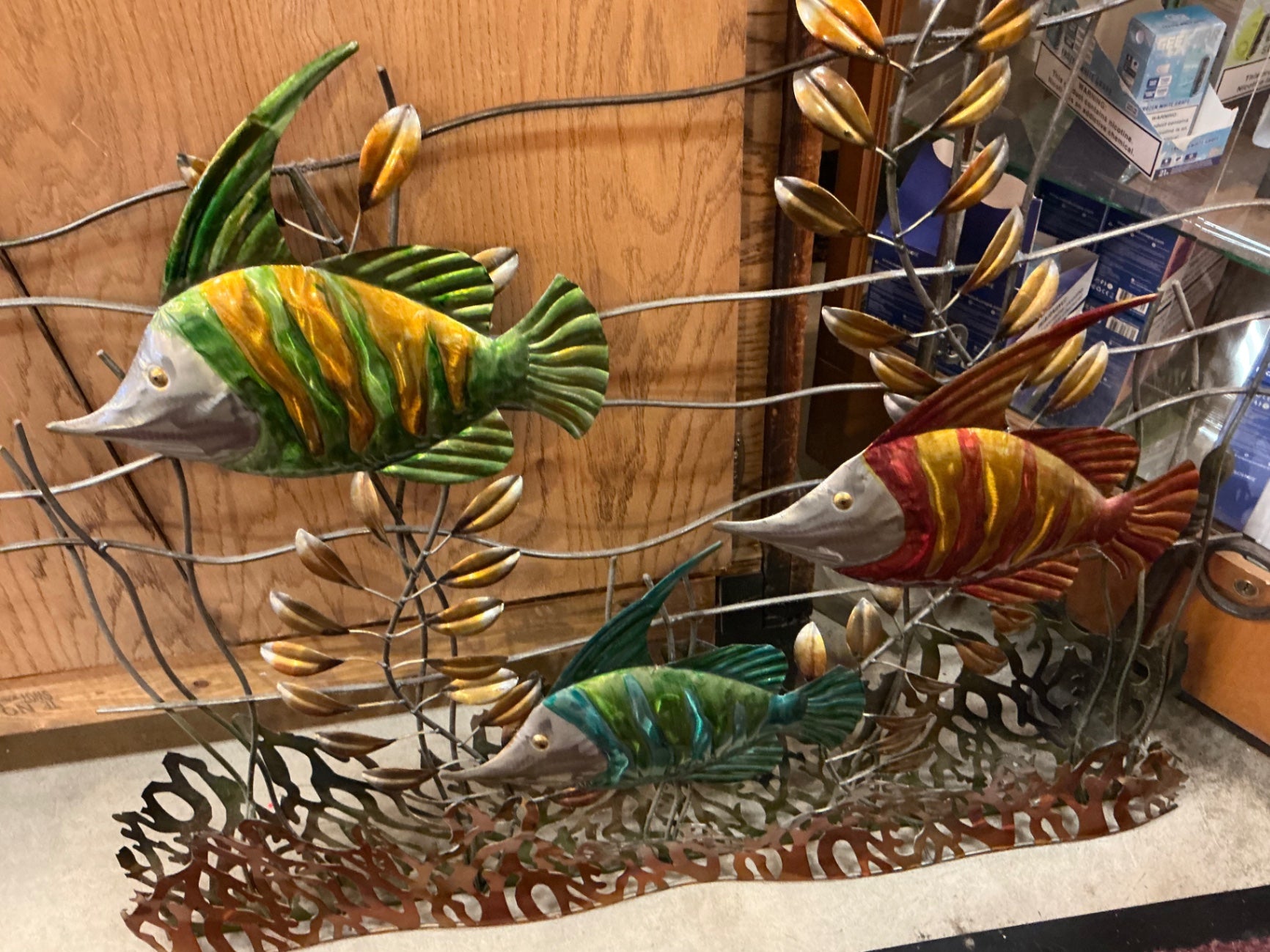 Decorative sculpture Multicolor (primarily green, yellow, red, and blue) Ceramic and metal