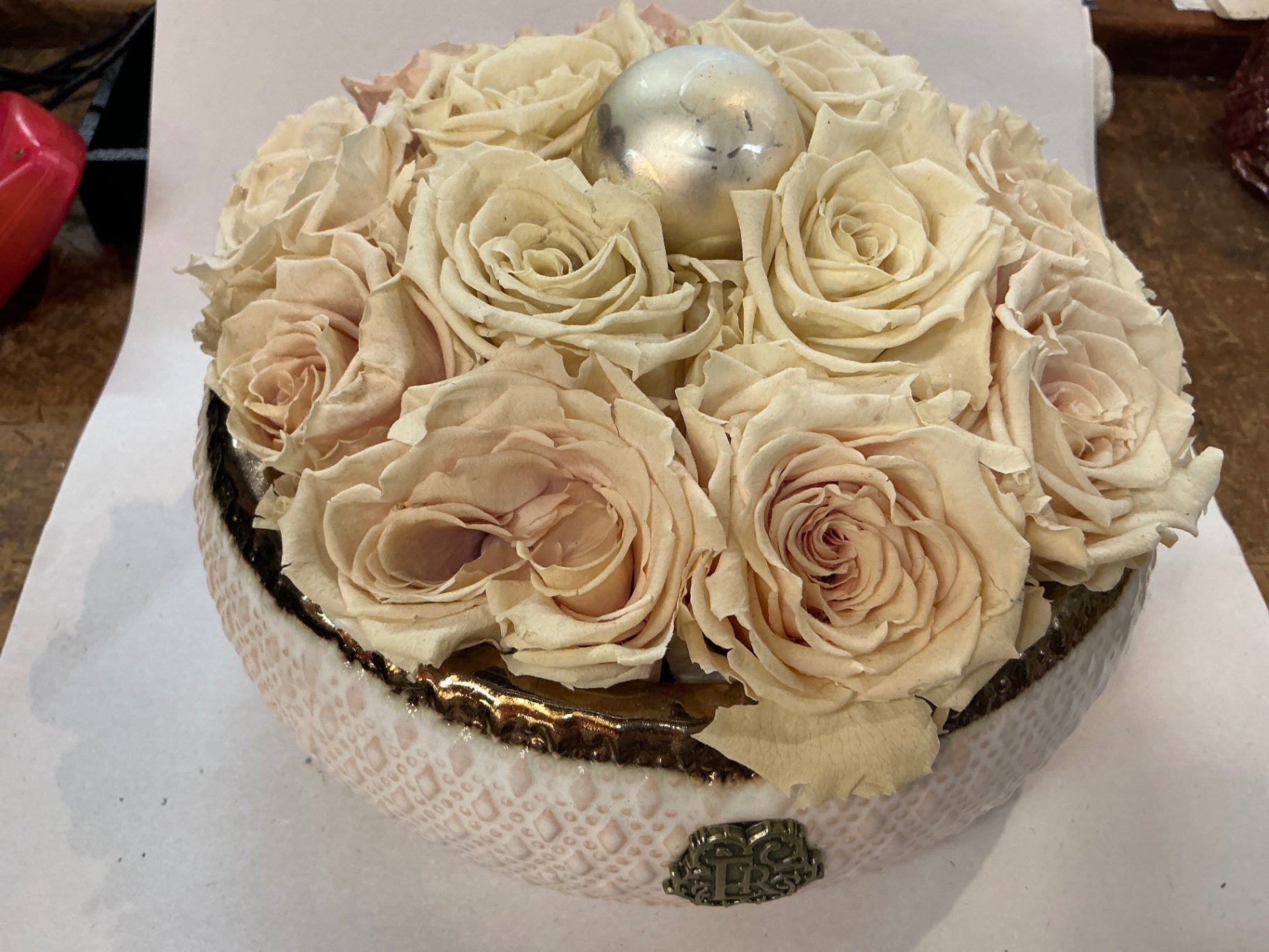 Home Decor Cream Flowers (likely preserved or artificial), metal (for the decorative element)
