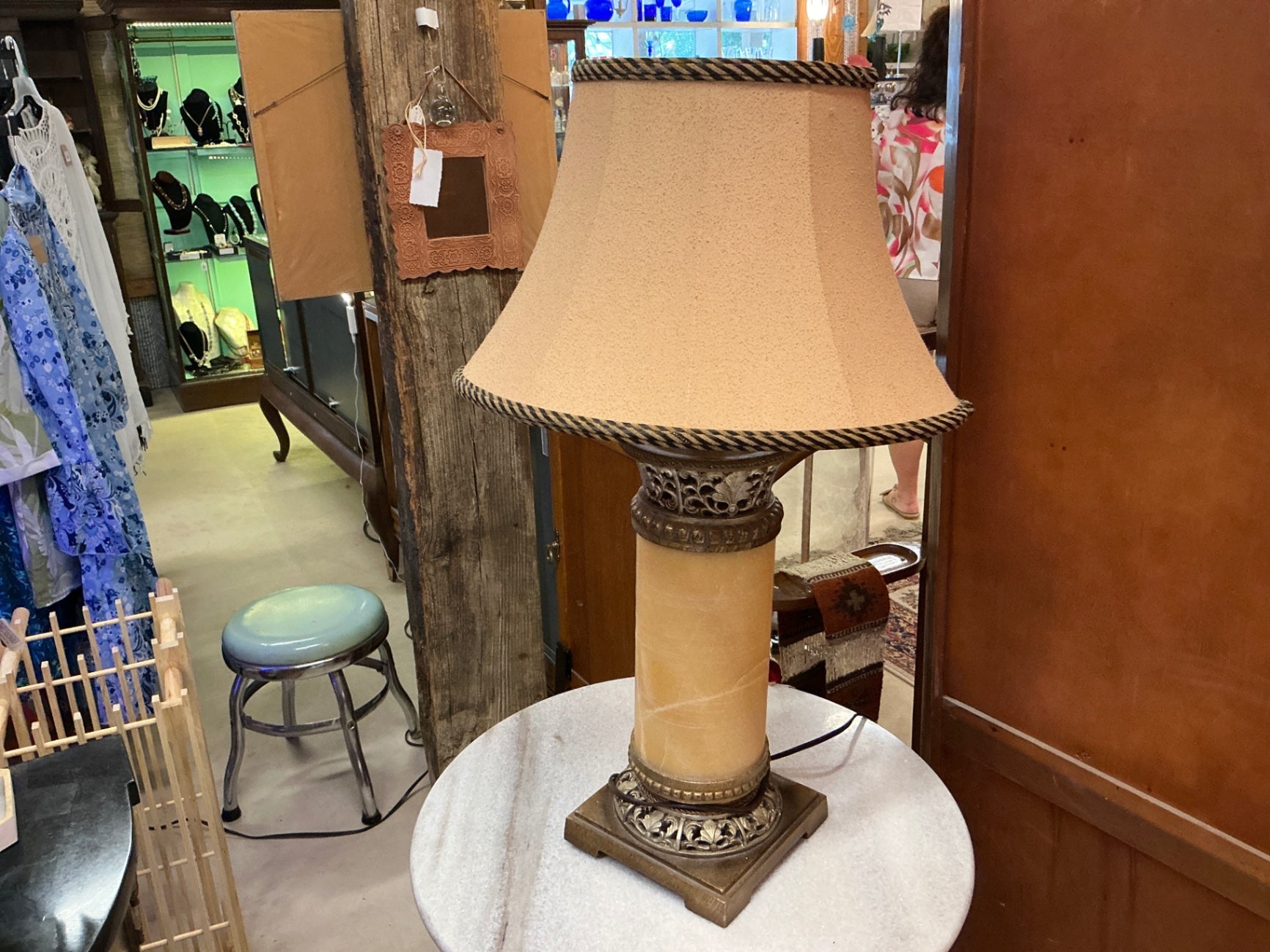Lamp Beige and dark accents Fabric, possibly metal and ceramic or resin