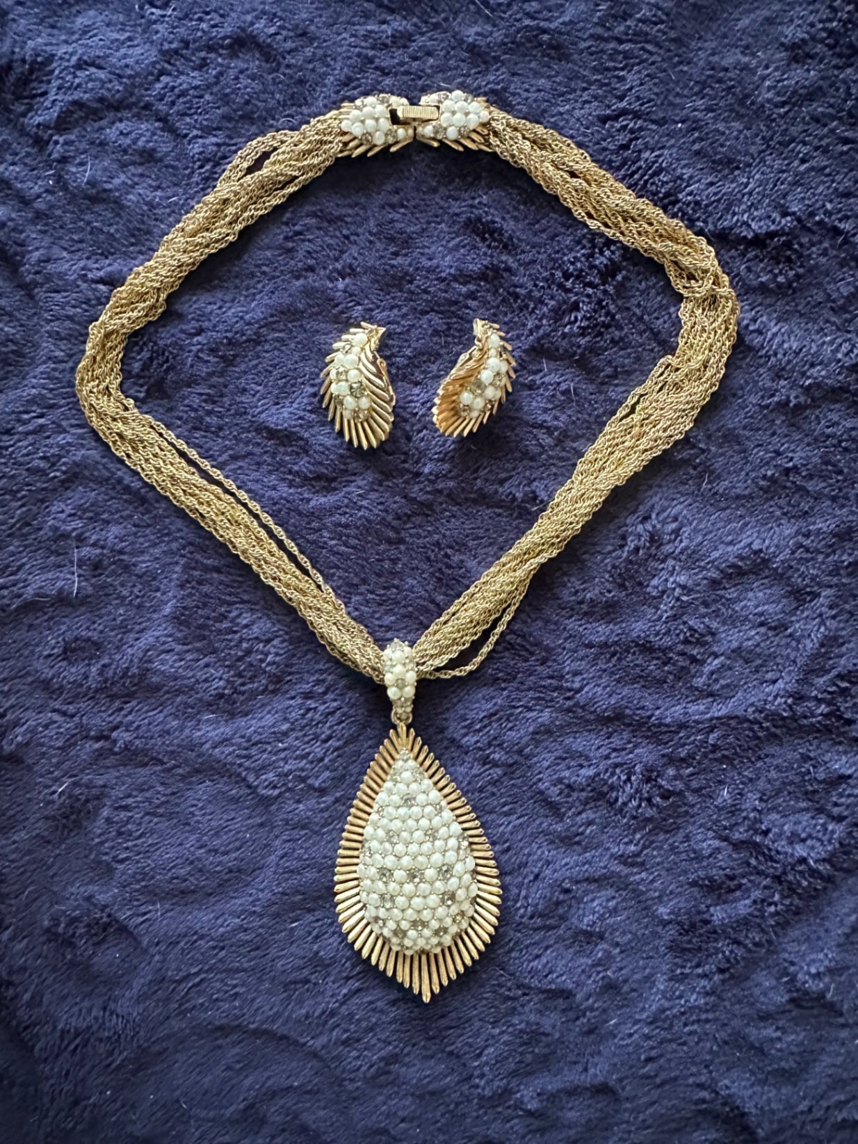12 strand gold tone trafari necklace with matching clip on earrings
