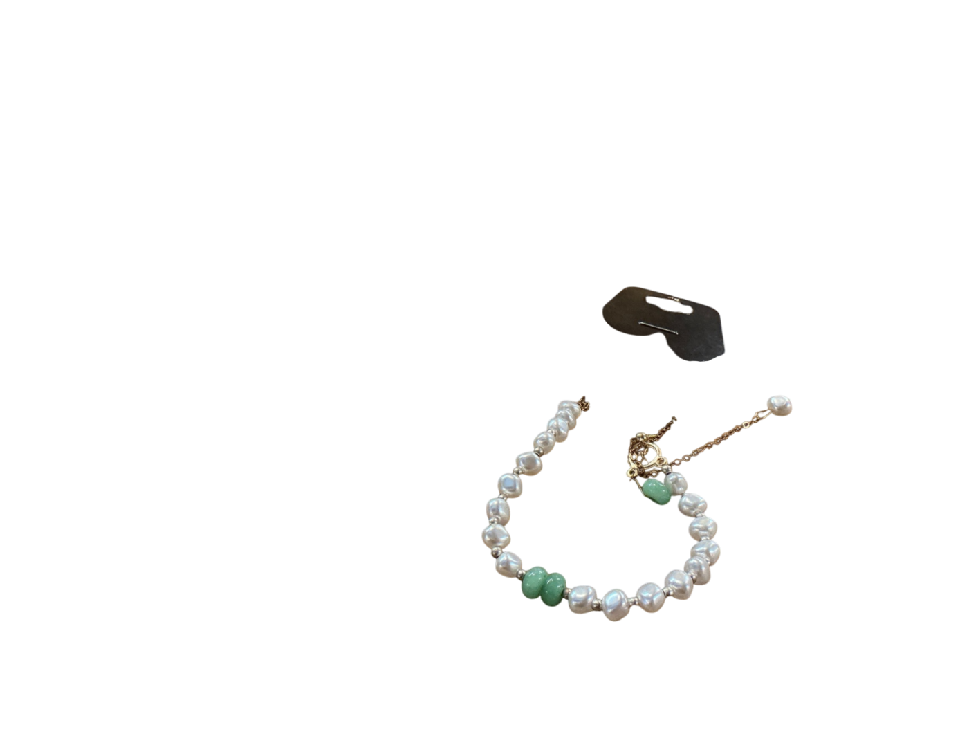 Jewelry White and Green Pearls and Metal