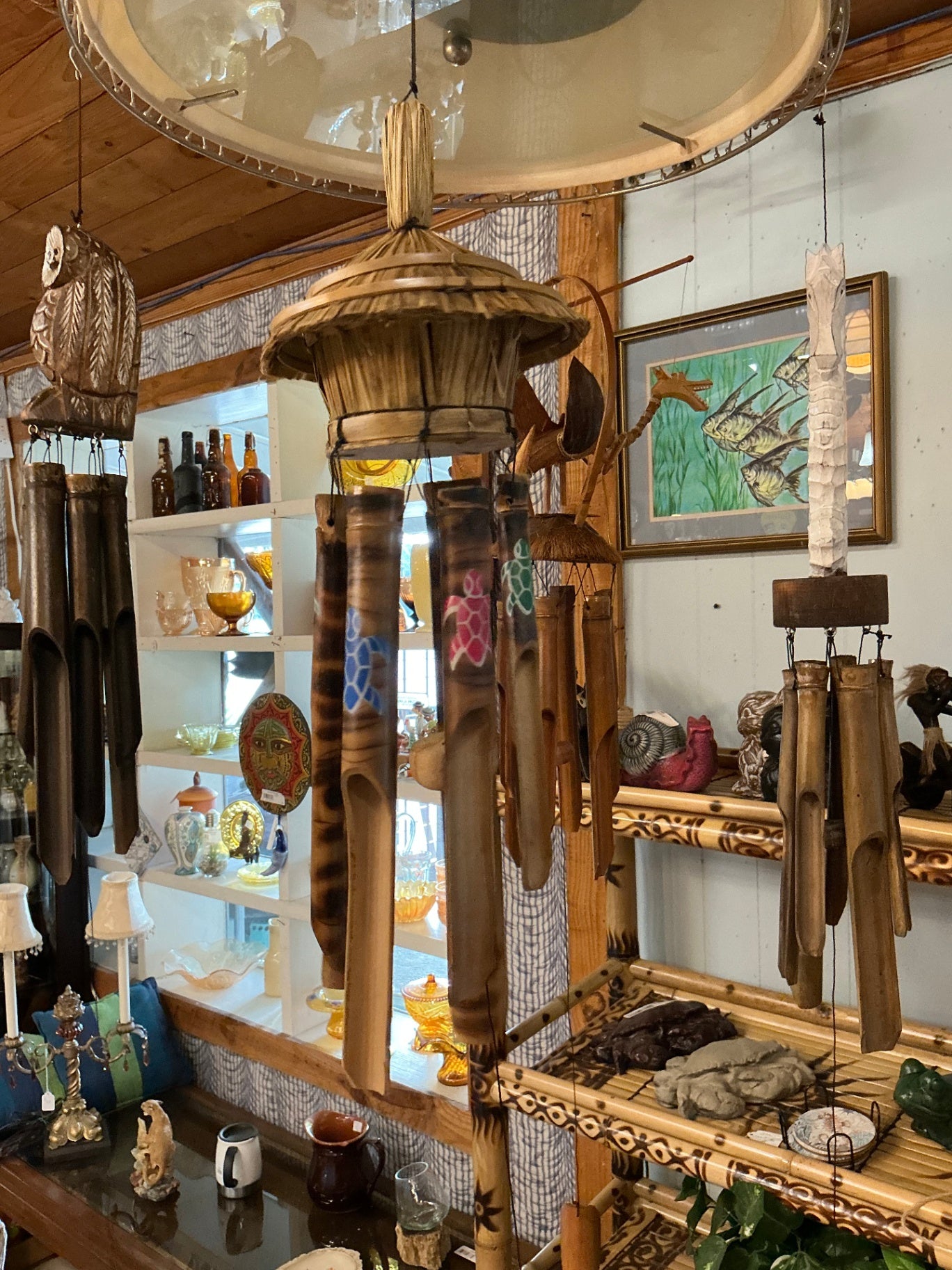 Wind Chime Natural wood tones with painted turtle motifs in pink, green, and blue Wood
