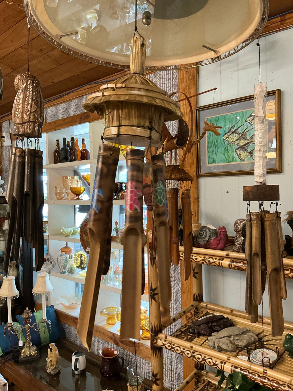 Wind Chime Natural wood tones with painted turtle motifs in pink, green, and blue Wood