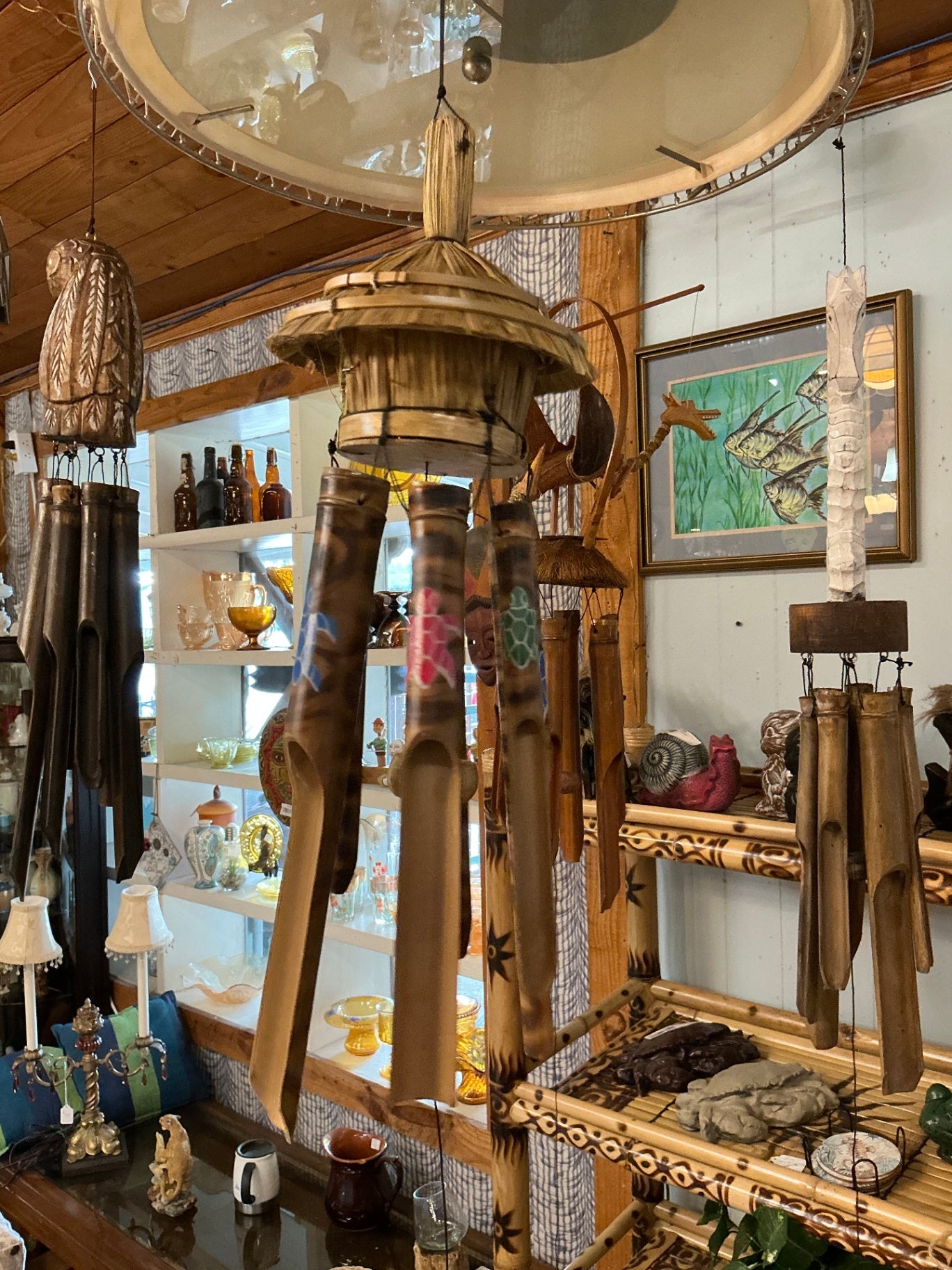 Wind Chime Natural wood tones with painted turtle motifs in pink, green, and blue Wood