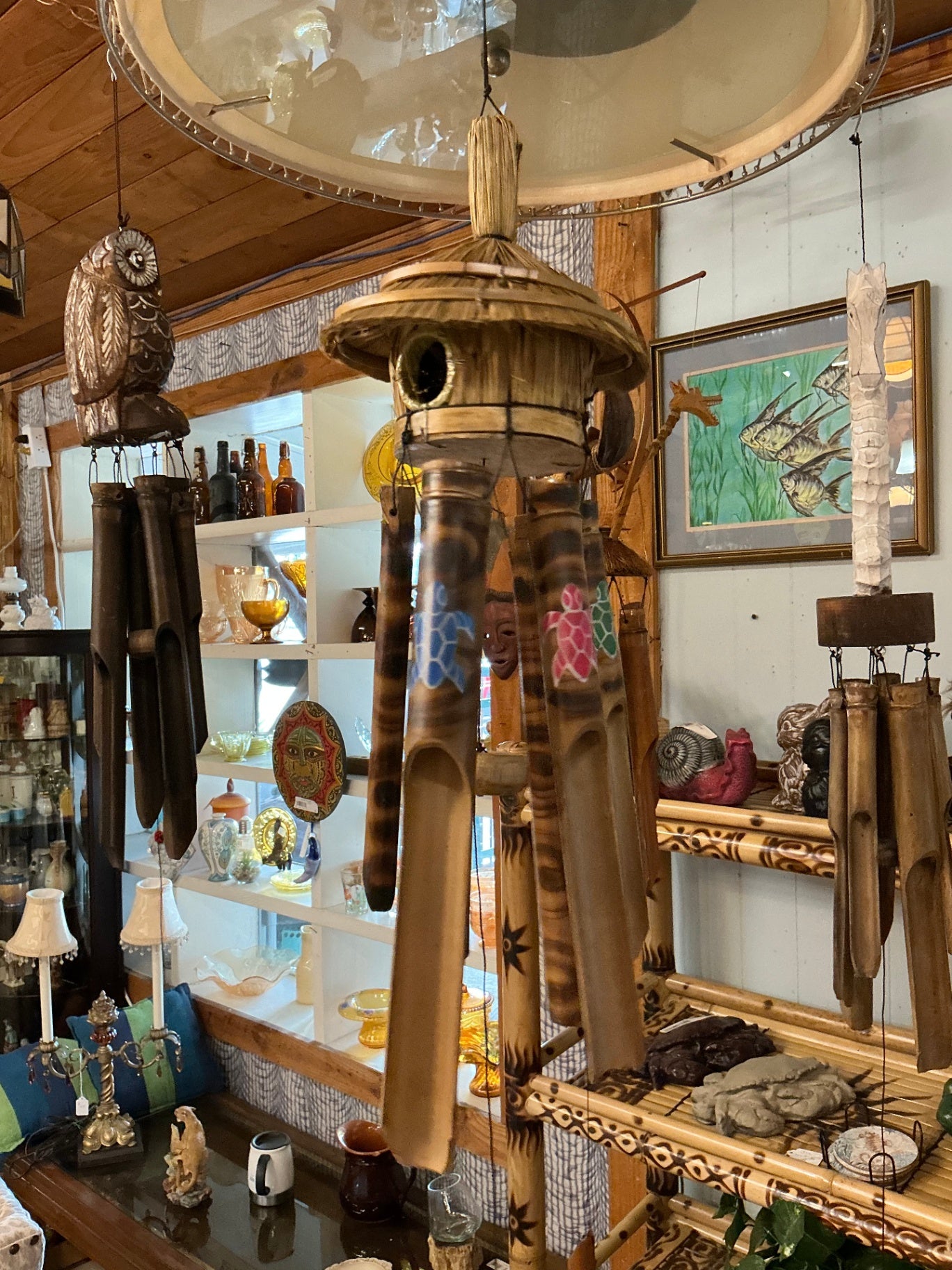Wind Chime Natural wood tones with painted turtle motifs in pink, green, and blue Wood