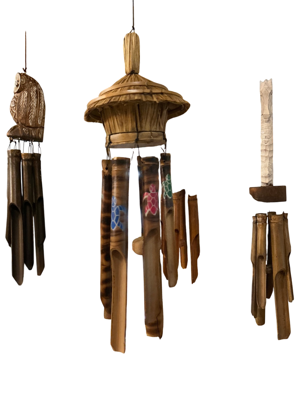Wind Chime Natural wood tones with painted turtle motifs in pink, green, and blue Wood