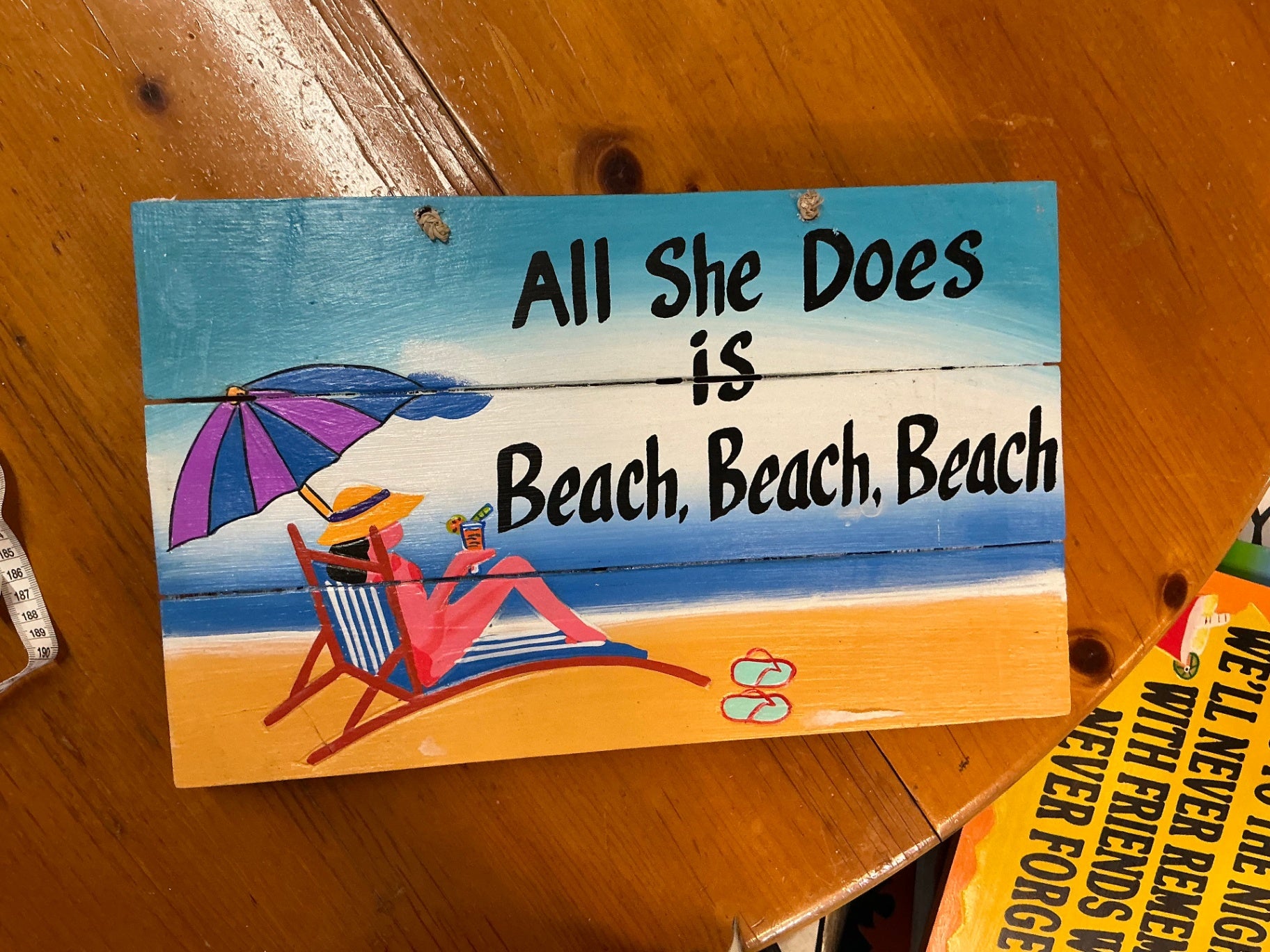 All She Does Is Beach Beach Beach Sign Decorative Wall Hanging Multicolor (blue, purple, orange, pink, yellow, white, black) Wood