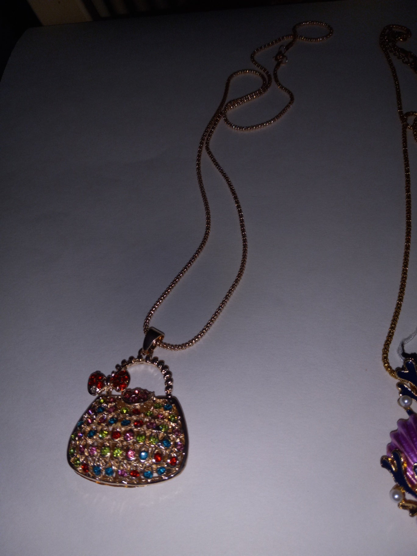 Pocket book betsy necklace dsc