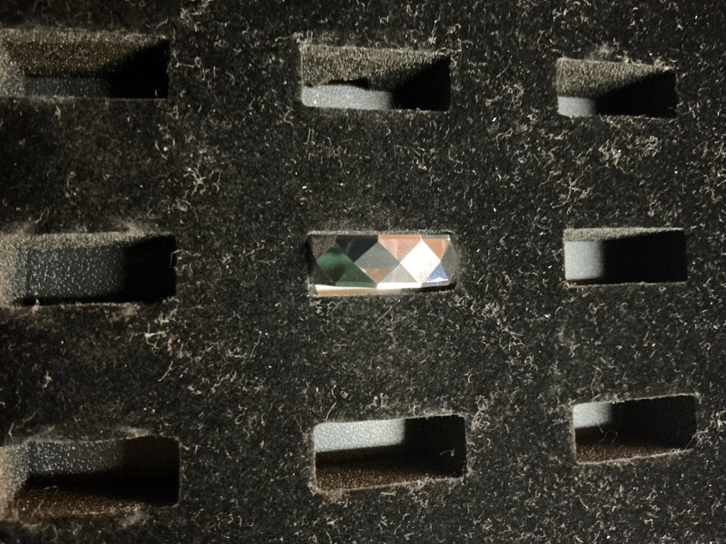 Jewelry Multicolor (reflective and shiny) Metal, possibly silver or stainless steel