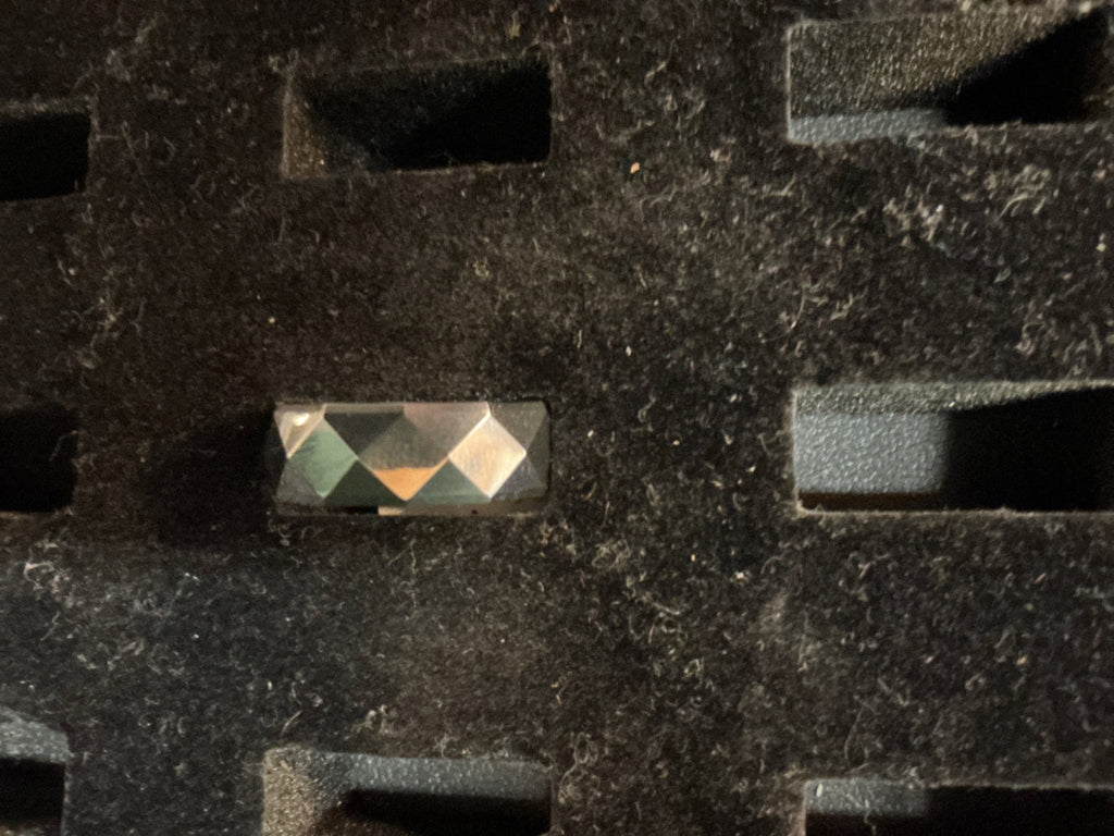 Jewelry Multicolor (reflective and shiny) Metal, possibly silver or stainless steel