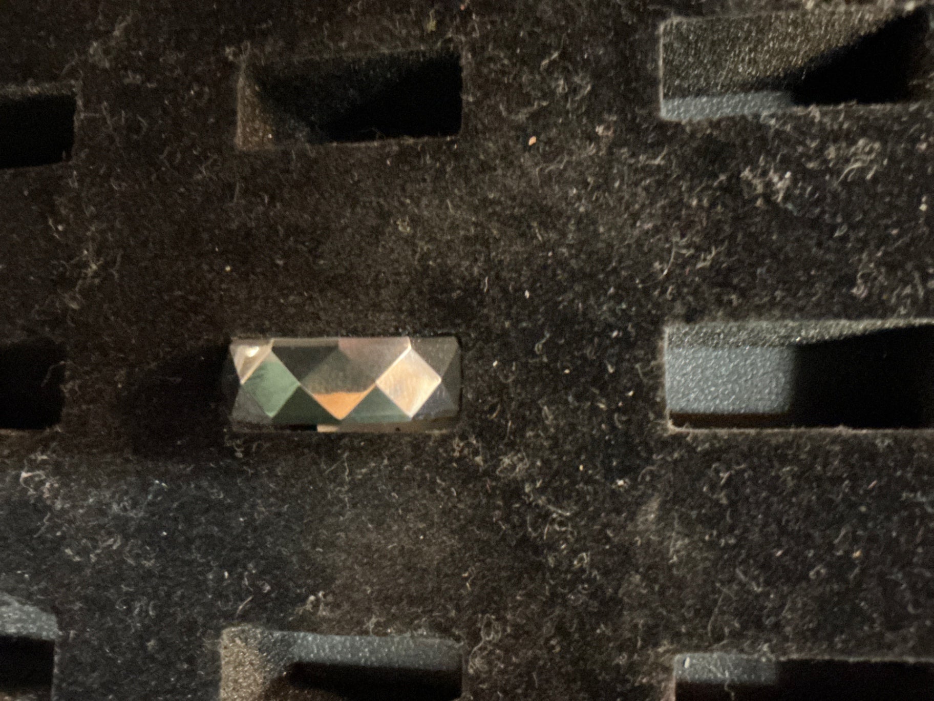 Jewelry Multicolor (reflective and shiny) Metal, possibly silver or stainless steel