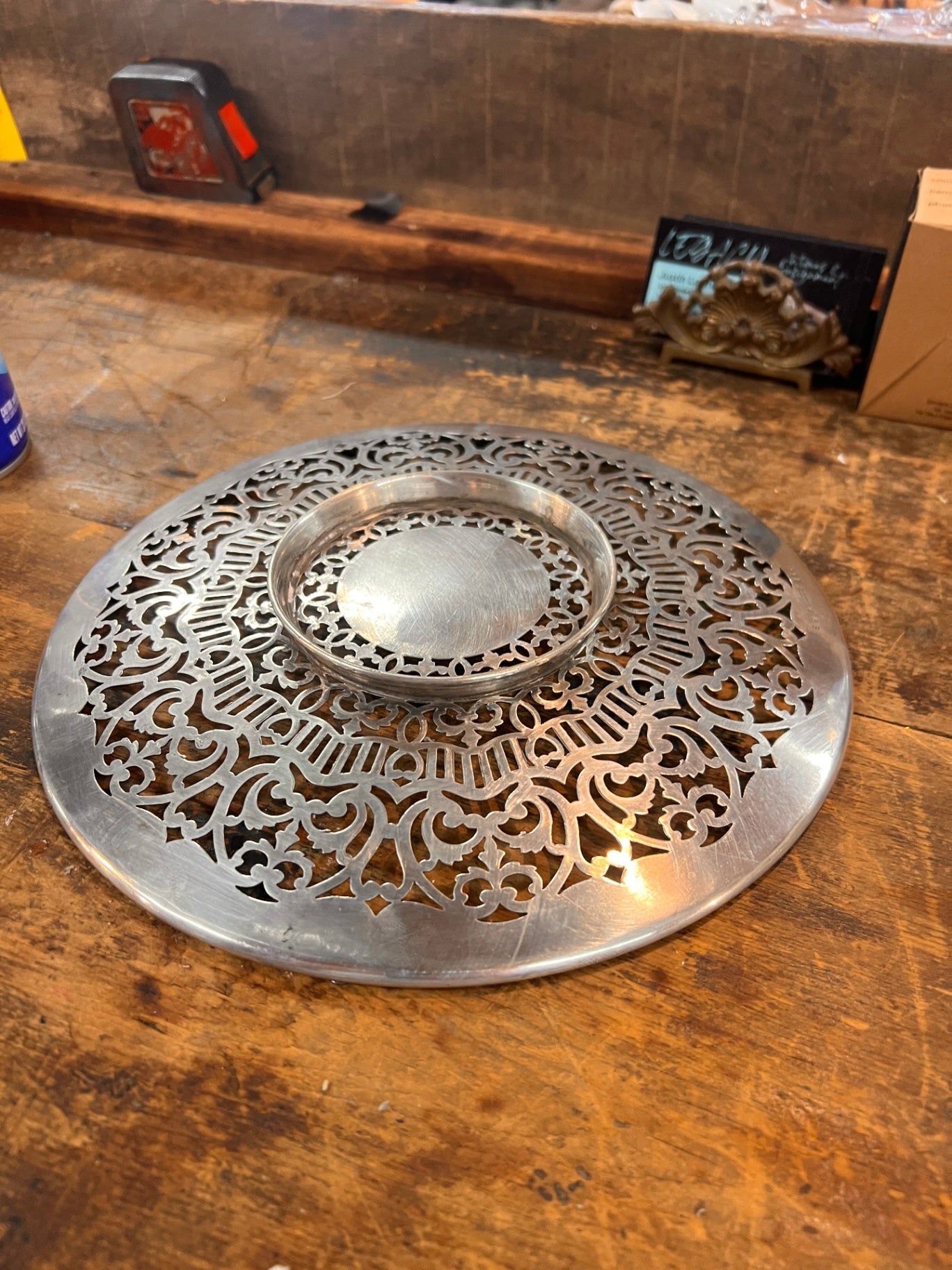 Vintage pierced silver plate (reticulated) trivet or coaster – marked "Silver Deposit on Nickel Silver" – likely from early 1900s