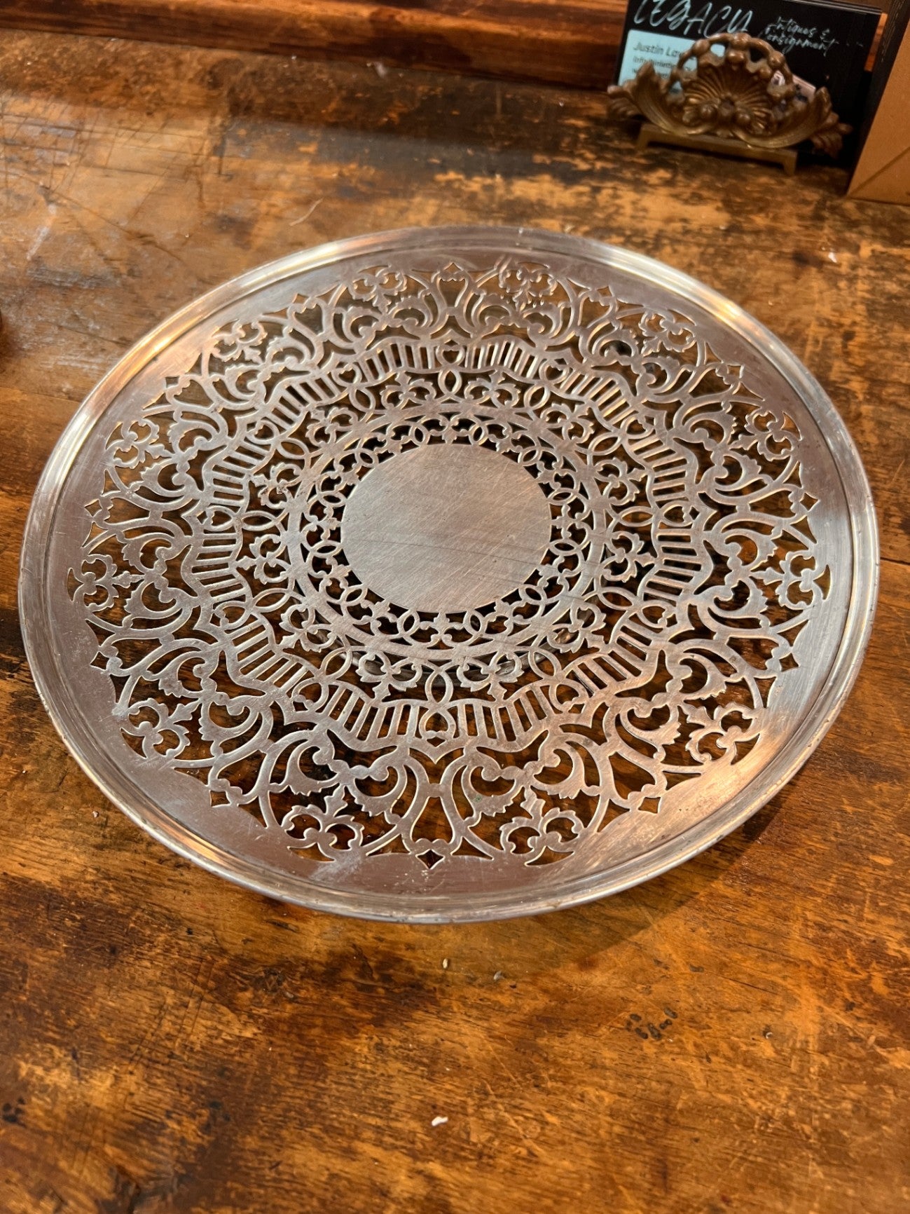 Vintage pierced silver plate (reticulated) trivet or coaster – marked "Silver Deposit on Nickel Silver" – likely from early 1900s