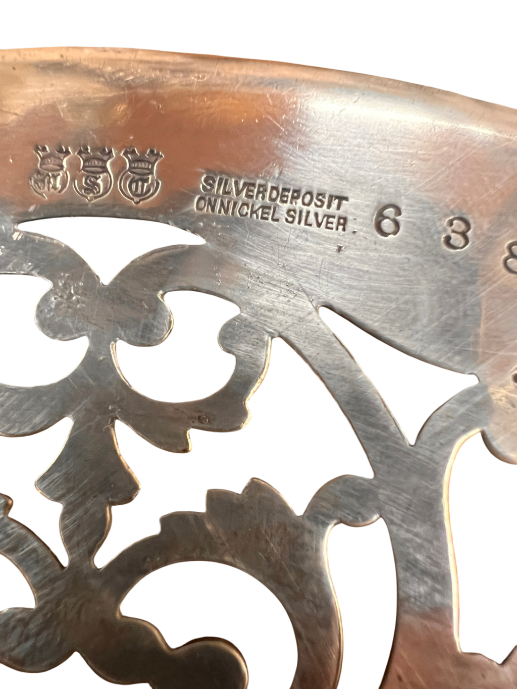 Vintage pierced silver plate (reticulated) trivet or coaster – marked "Silver Deposit on Nickel Silver" – likely from early 1900s