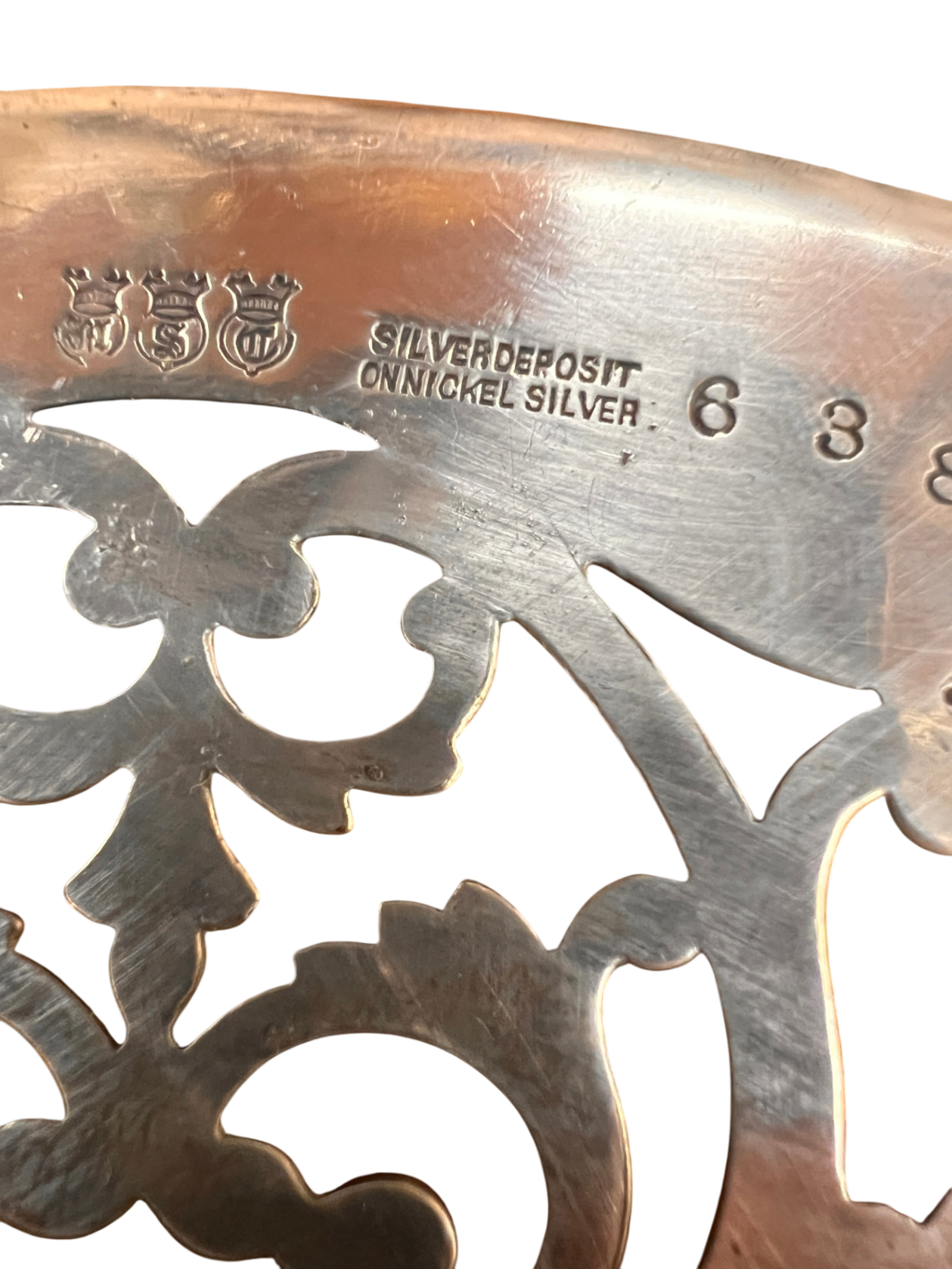 Vintage pierced silver plate (reticulated) trivet or coaster – marked "Silver Deposit on Nickel Silver" – likely from early 1900s