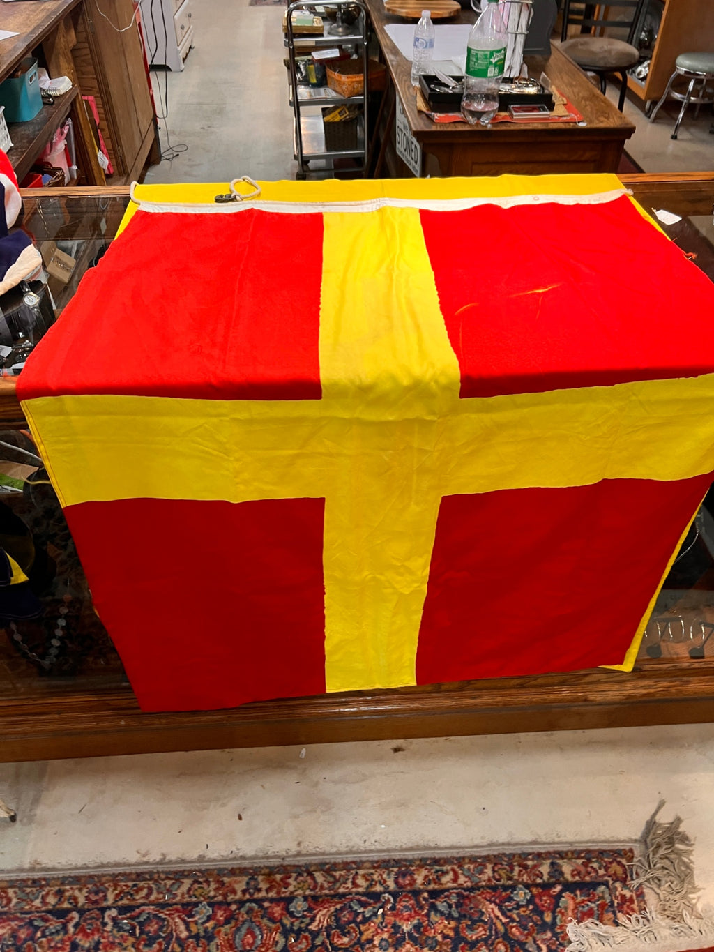 "R" (Romeo) – Red with Yellow Cross Flag