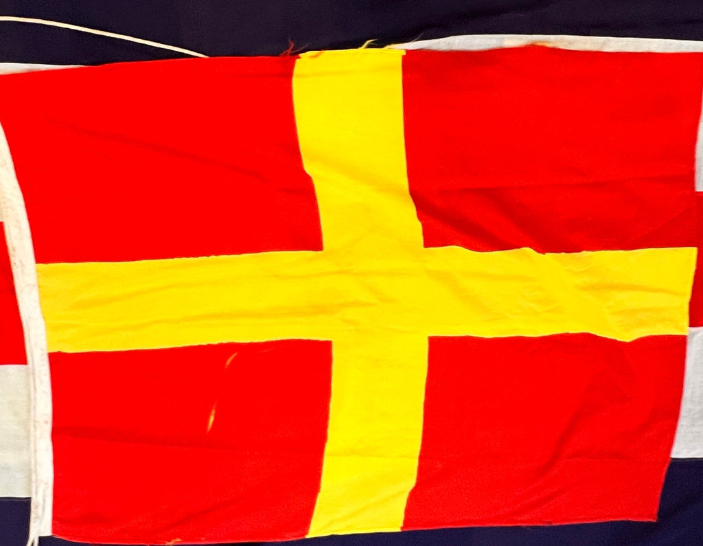 "R" (Romeo) – Red with Yellow Cross Flag