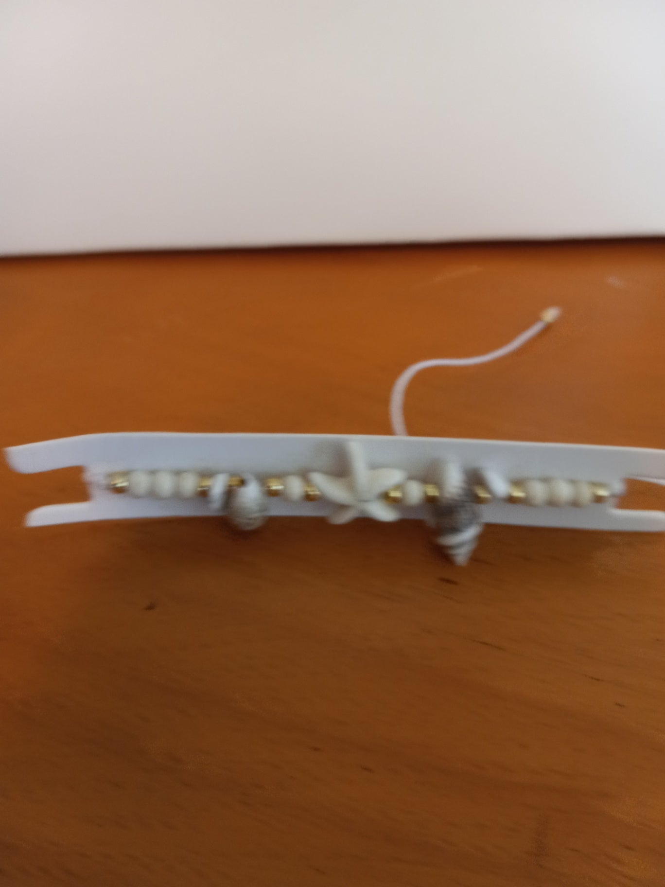 String pull bracelet dsc