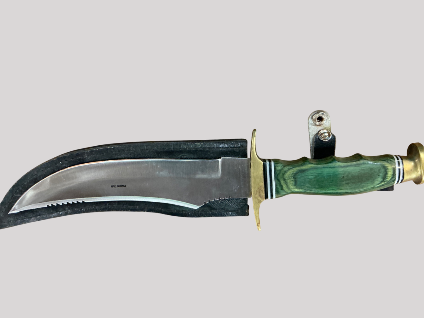 PAKISTAN Silver and green Metal and possibly plastic or bakelite (handle) Knife