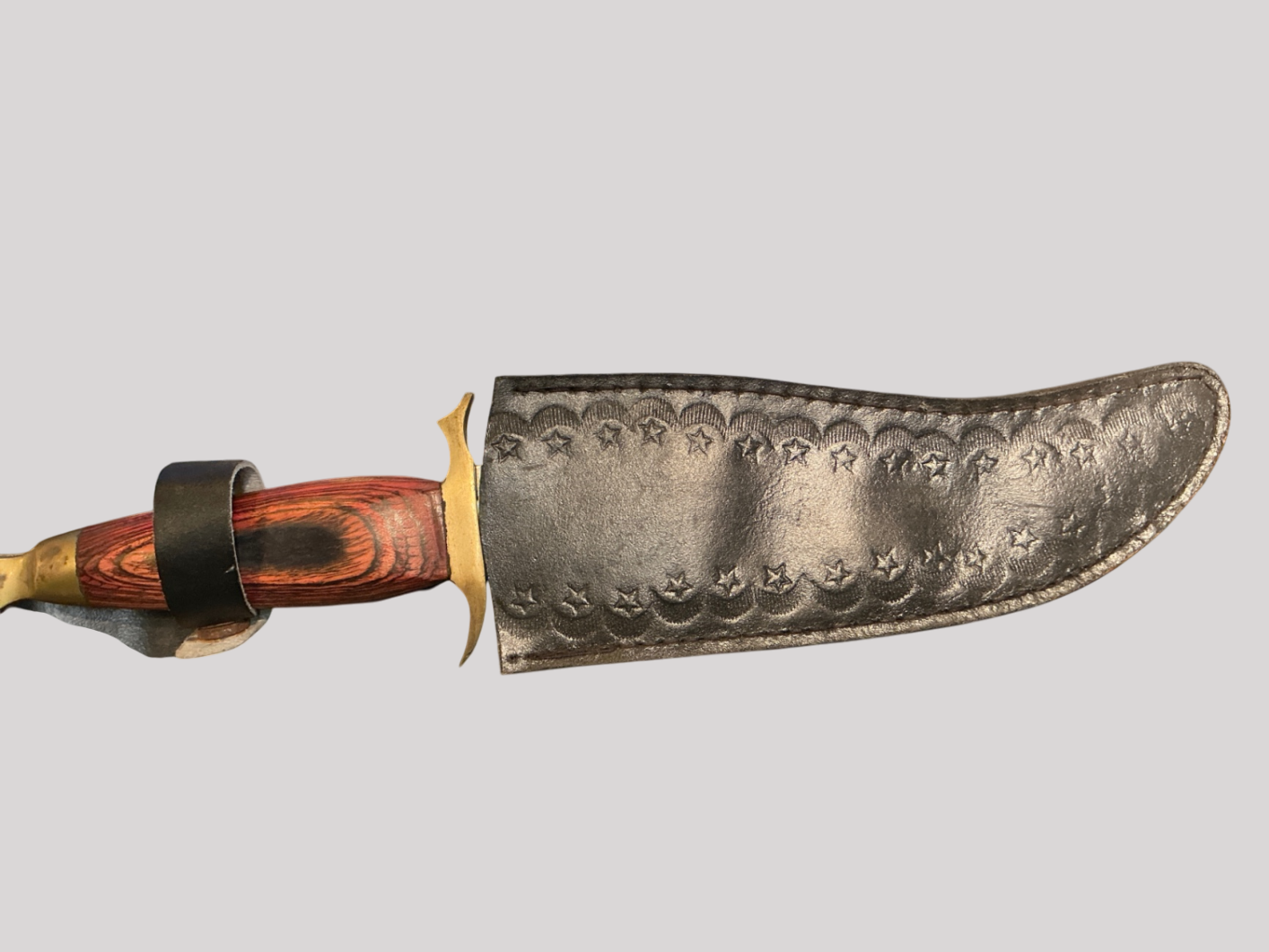 Silver and reddish-brown Metal and wood Knife Pakistan Made