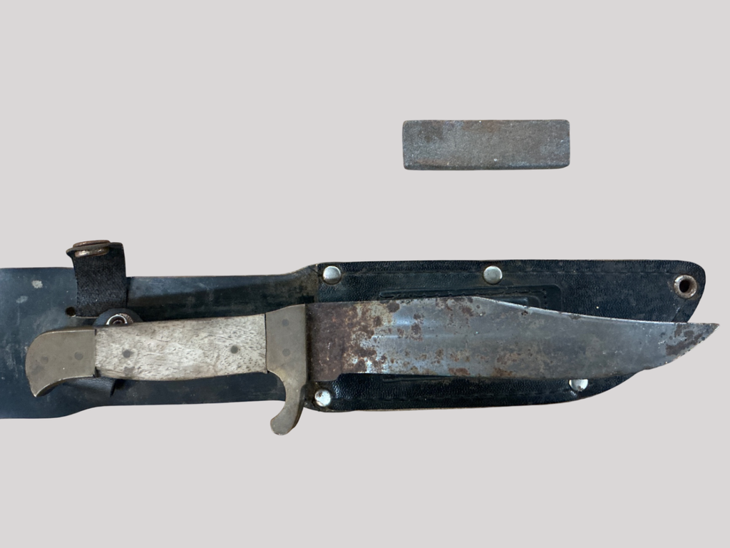 Silver and black Metal and plastic Knife