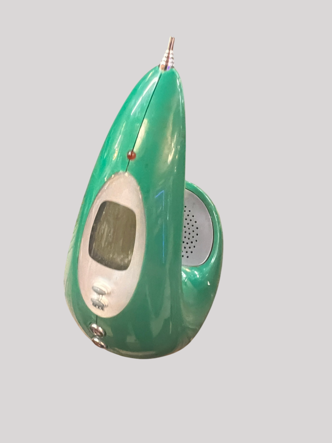 Green and Silver Plastic and Metal am/fm radio