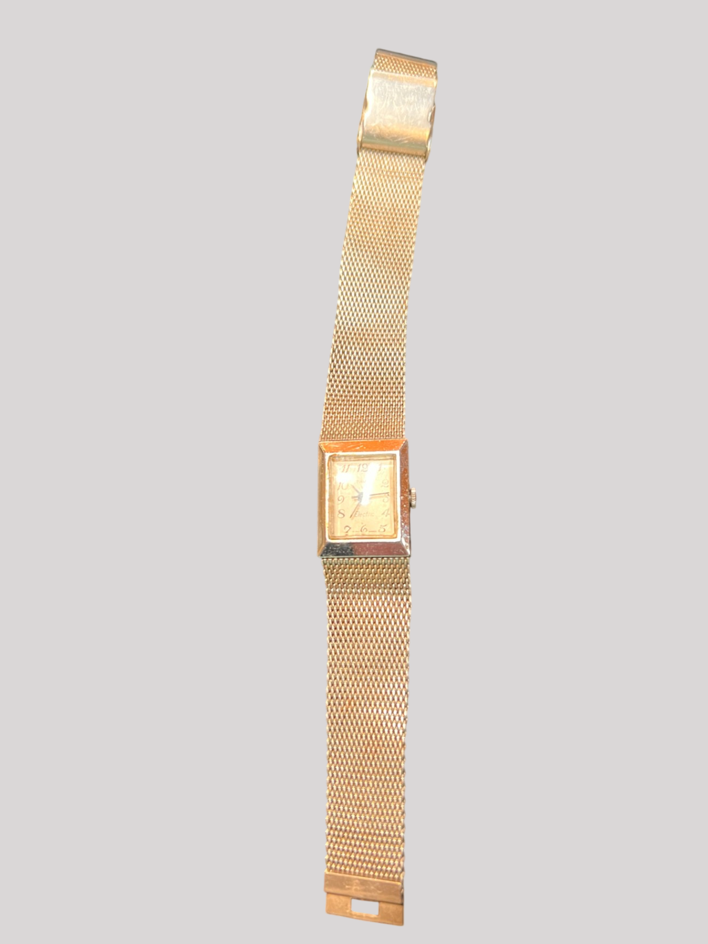 Vintage Timex Electric rectangular wristwatch (silver-tone, late 1960s–early 1970s)
