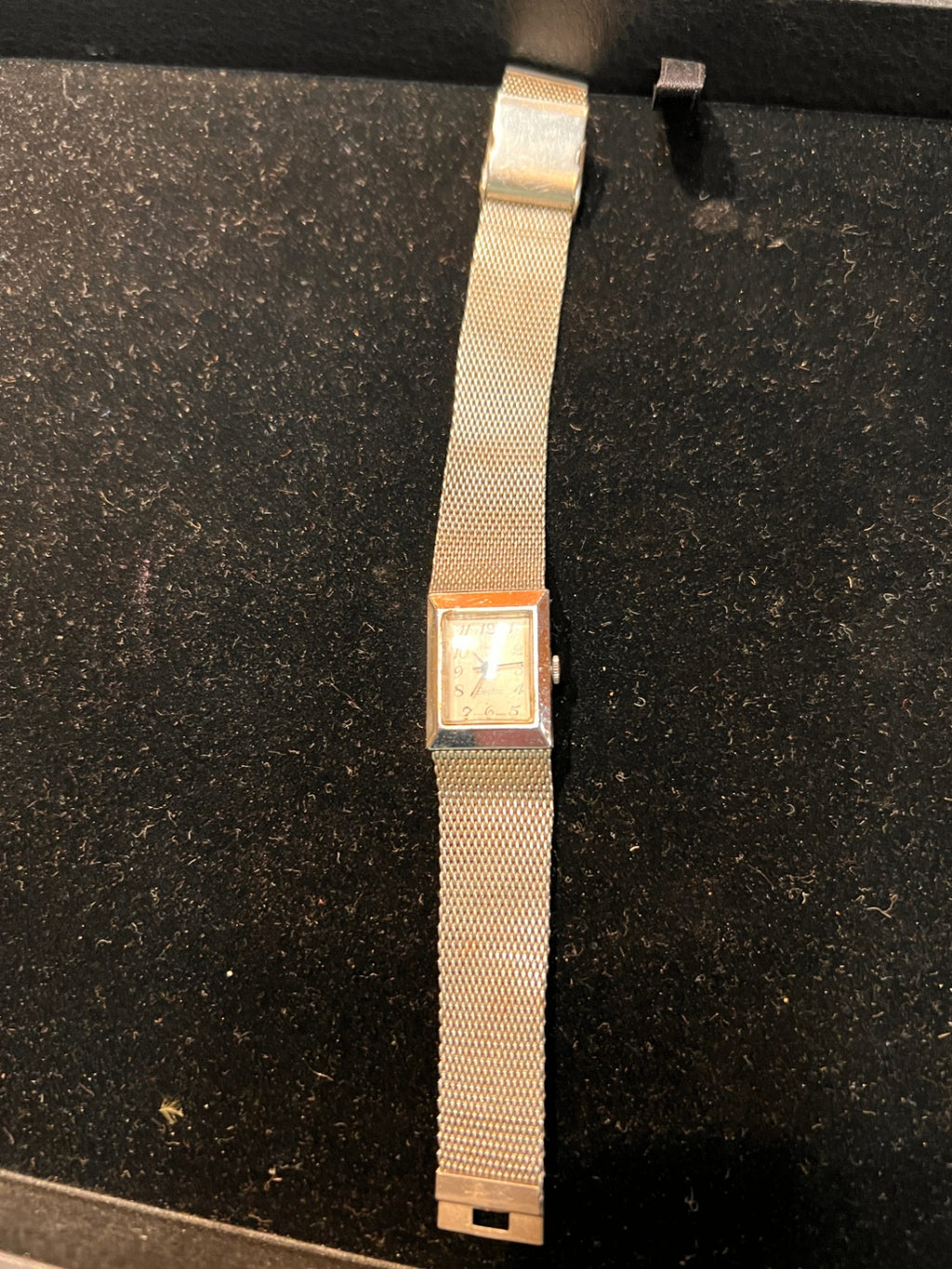 Vintage Timex Electric rectangular wristwatch (silver-tone, late 1960s–early 1970s)