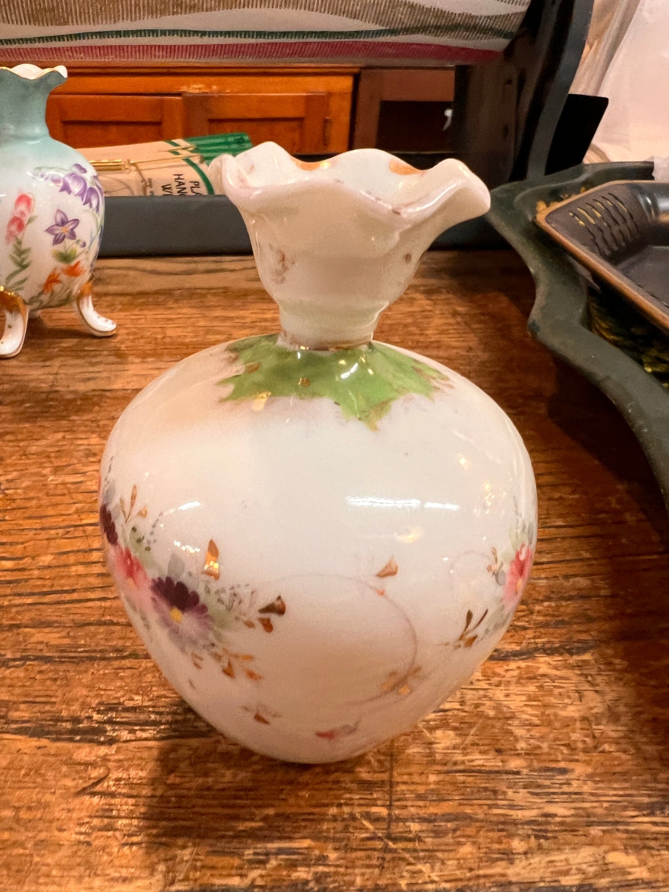 White with floral accents in pink, purple, and gold Porcelain Vase