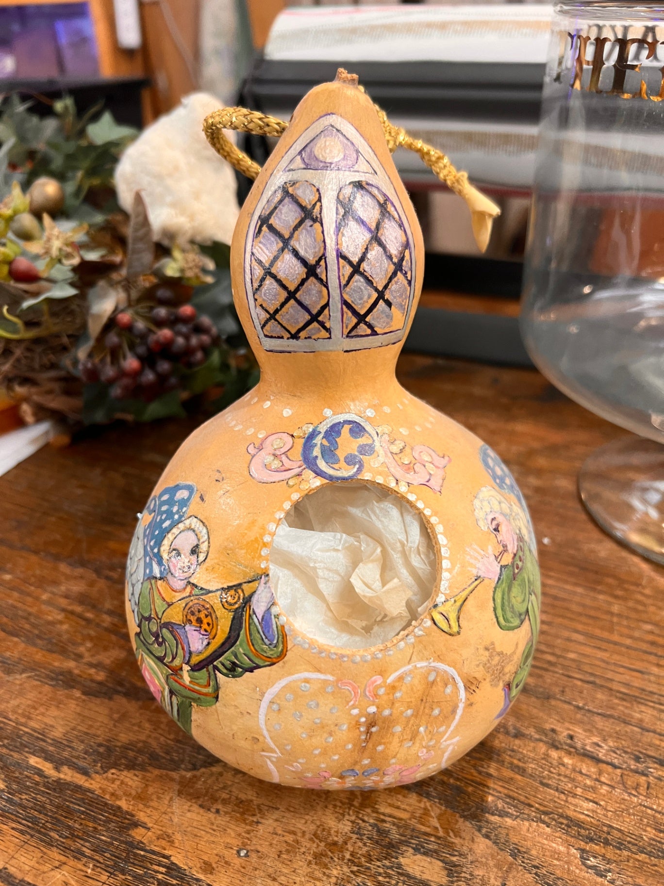 Hand-painted dried gourd ornament/lantern, signed Claire de Hoffman, dated 1997. Features angelic musicians and decorative motifs.