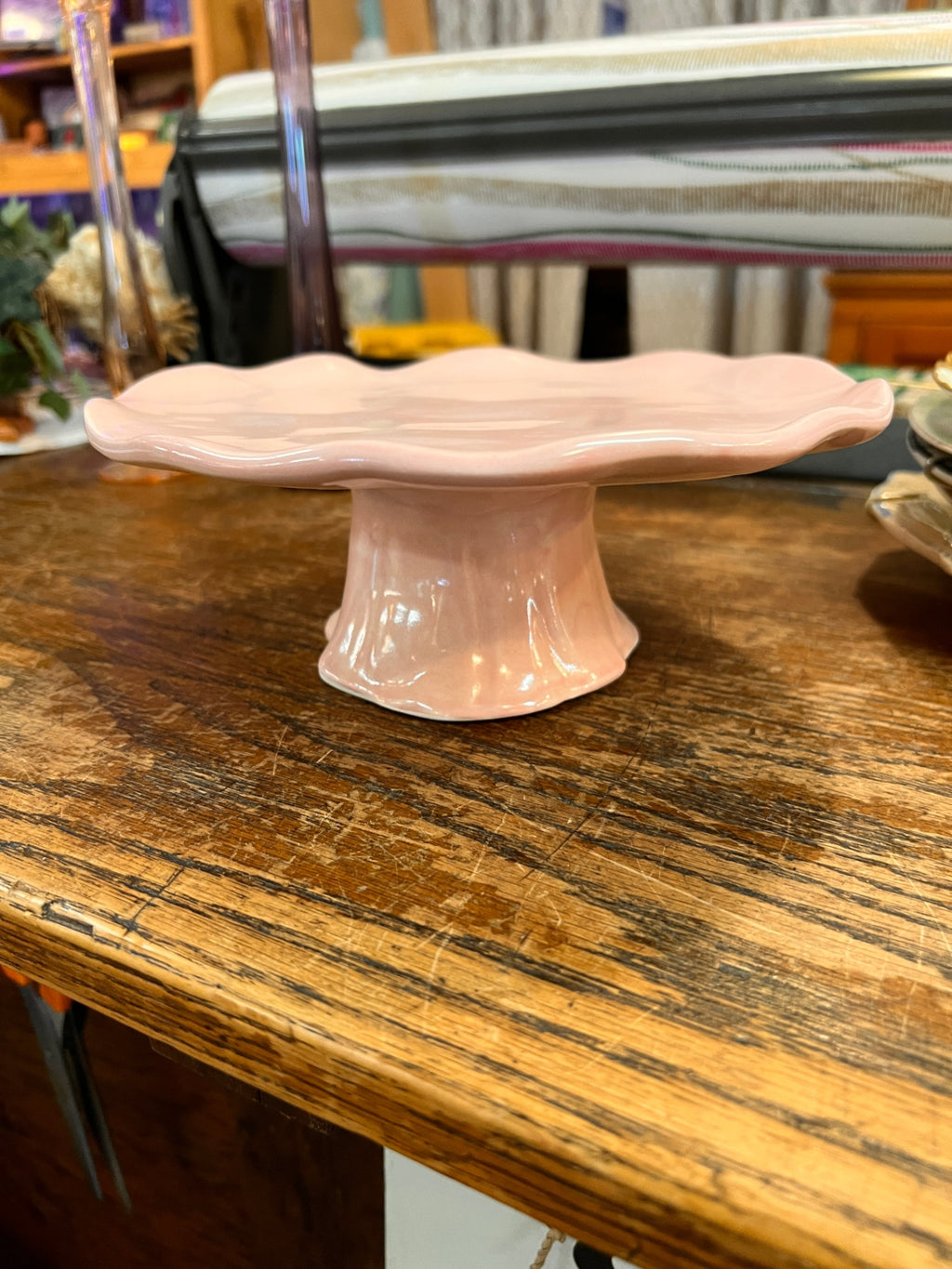 pink pedestal dish/compote, and the stamp inside reads:  "Eison Art Pottery – Crabtree, Evelyn."