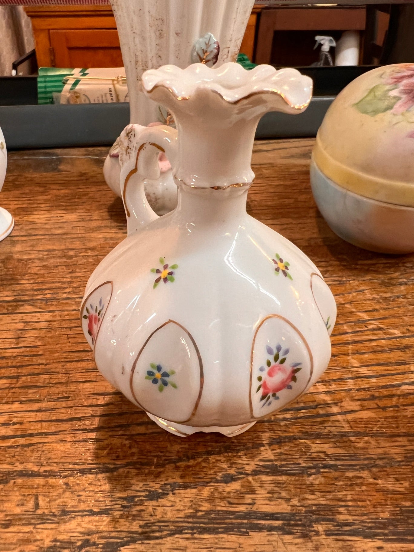 White with pink, purple, green, and gold accents Porcelain Vase