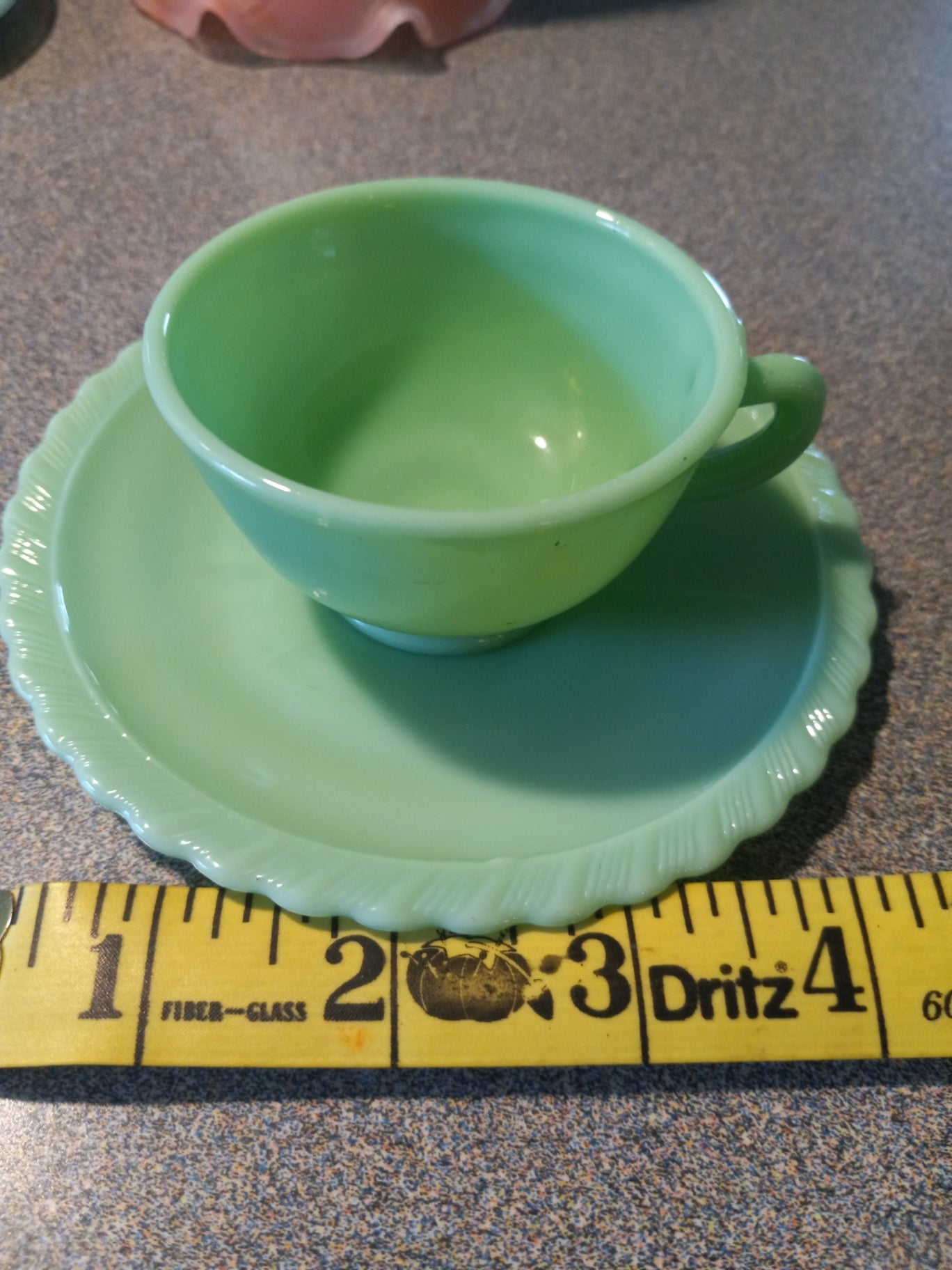 Jadeite tiny teacup n saucer dsc