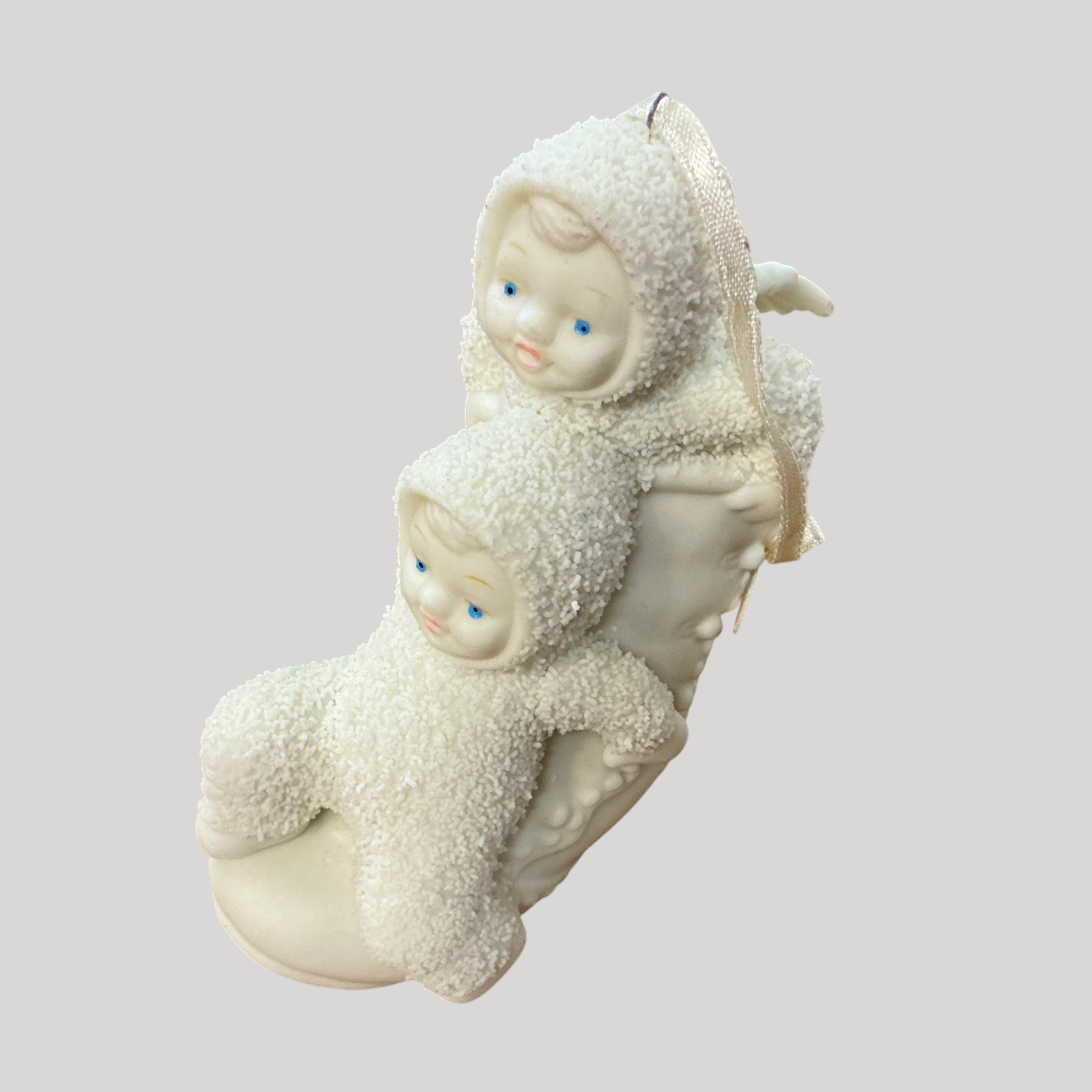 Vintage Snow Babies Figurine – “Children in Snowsuits on Sled”