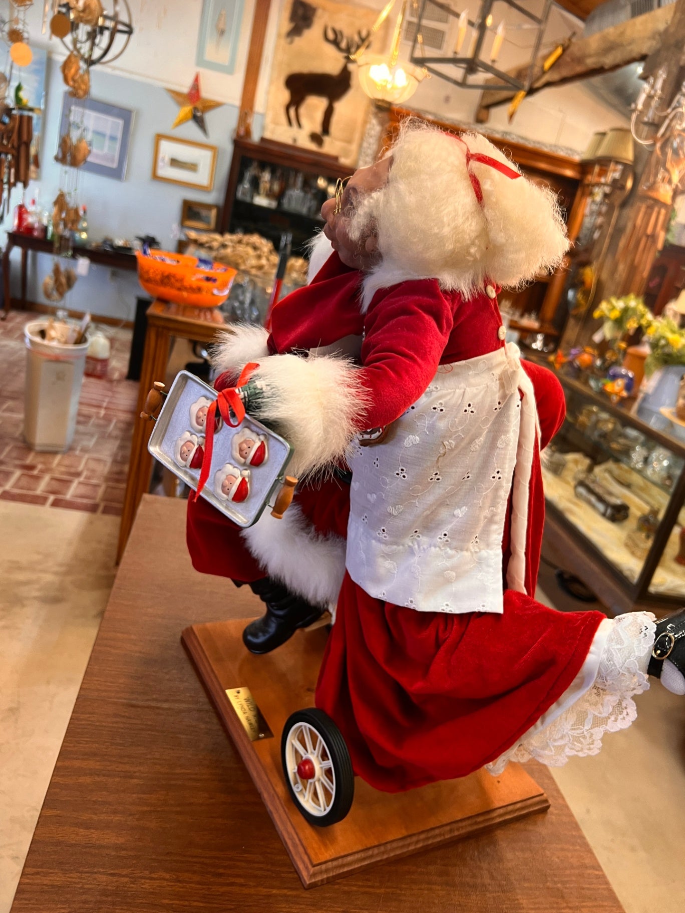 “Wild Ride” Santa and Mrs. Claus Sculpture by Lynda Hawley – 23" x 24" x 21"