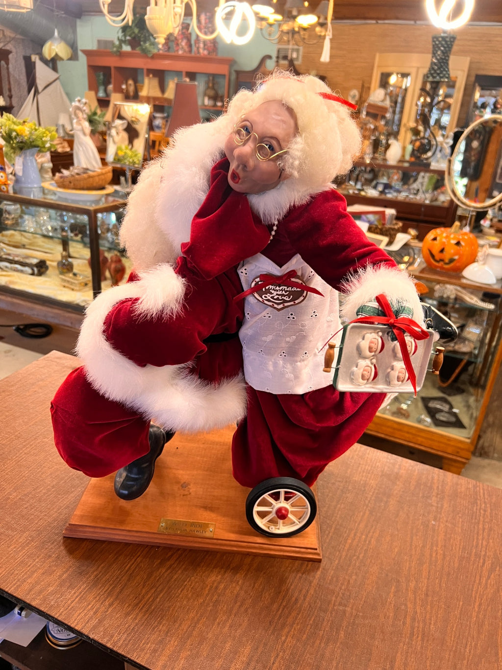 “Wild Ride” Santa and Mrs. Claus Sculpture by Lynda Hawley – 23" x 24" x 21"