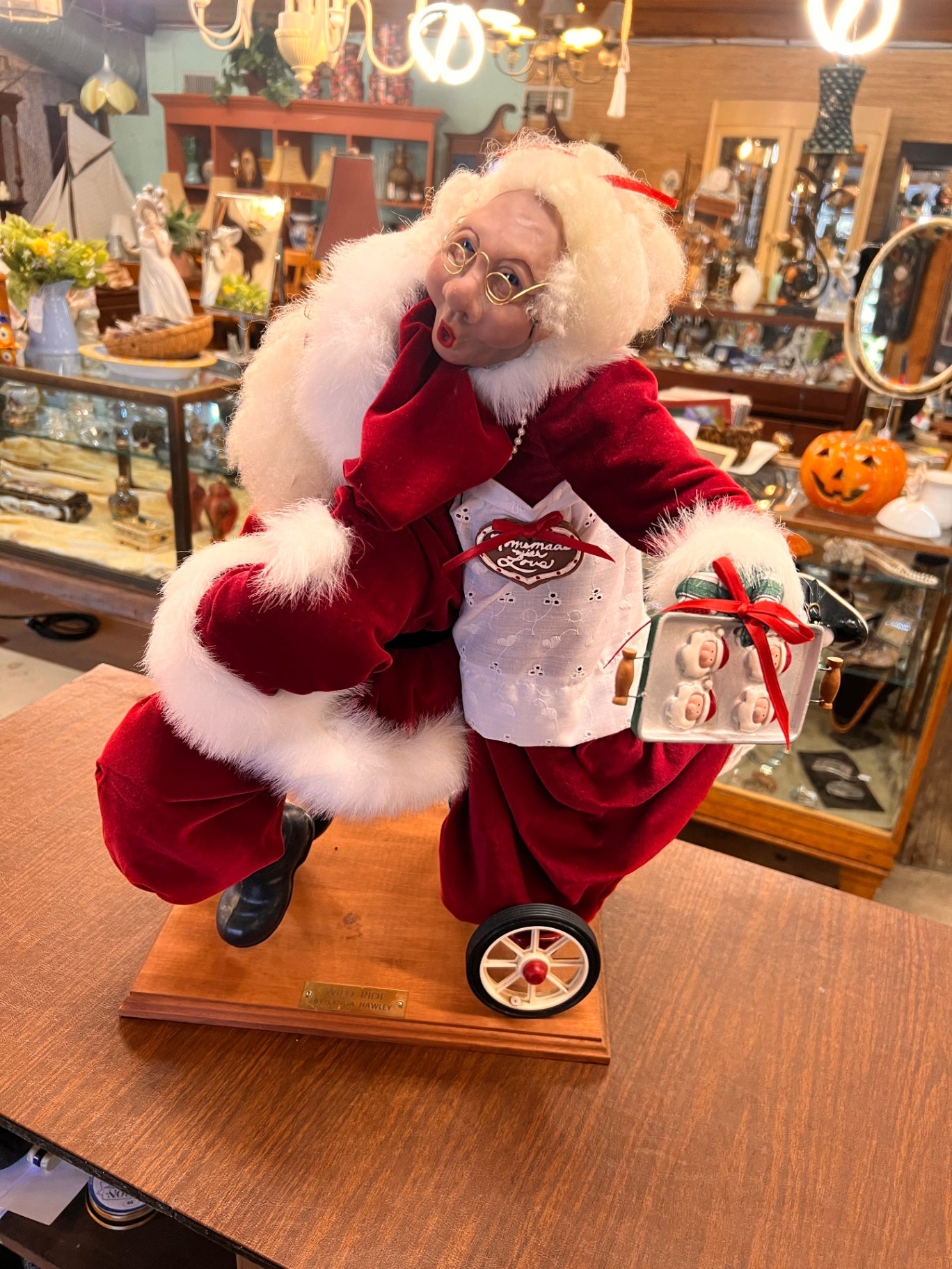 “Wild Ride” Santa and Mrs. Claus Sculpture by Lynda Hawley – 23" x 24" x 21"