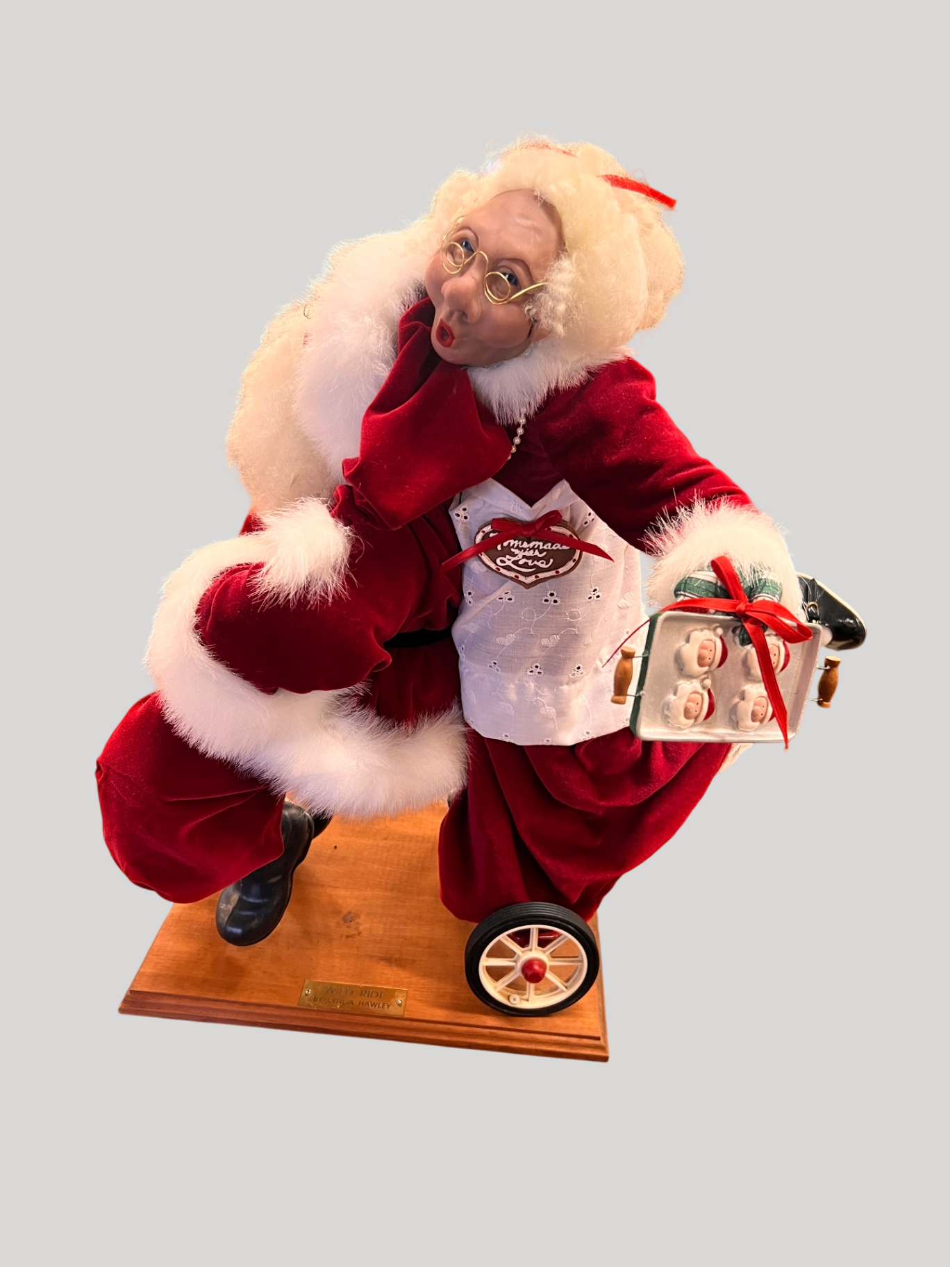 “Wild Ride” Santa and Mrs. Claus Sculpture by Lynda Hawley – 23" x 24" x 21"