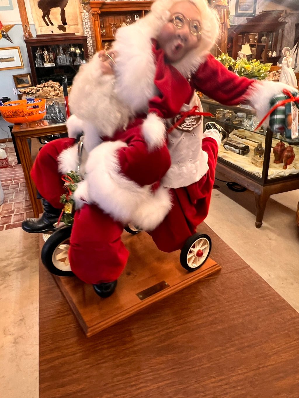 “Wild Ride” Santa and Mrs. Claus Sculpture by Lynda Hawley – 23" x 24" x 21"