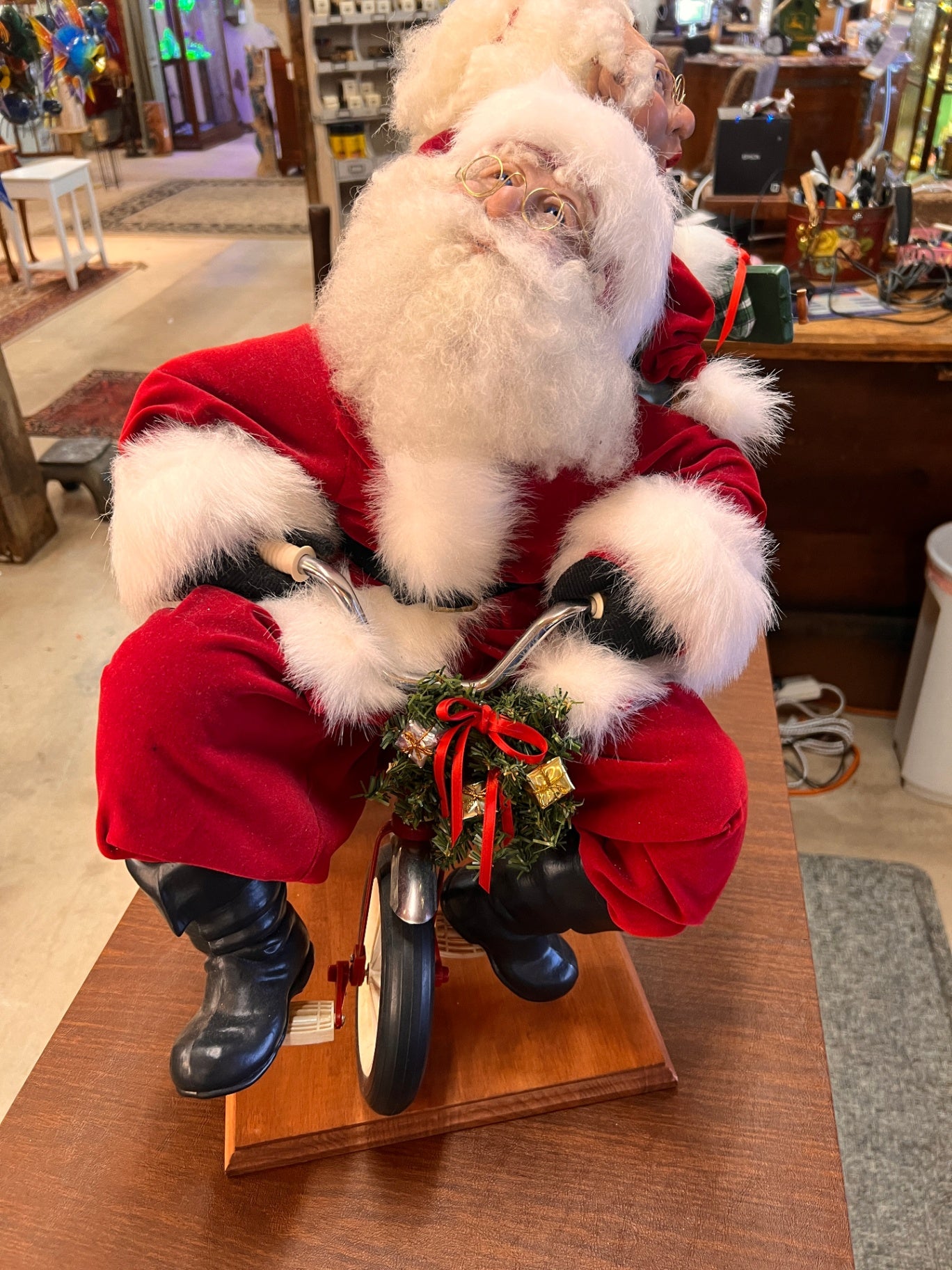 “Wild Ride” Santa and Mrs. Claus Sculpture by Lynda Hawley – 23" x 24" x 21"