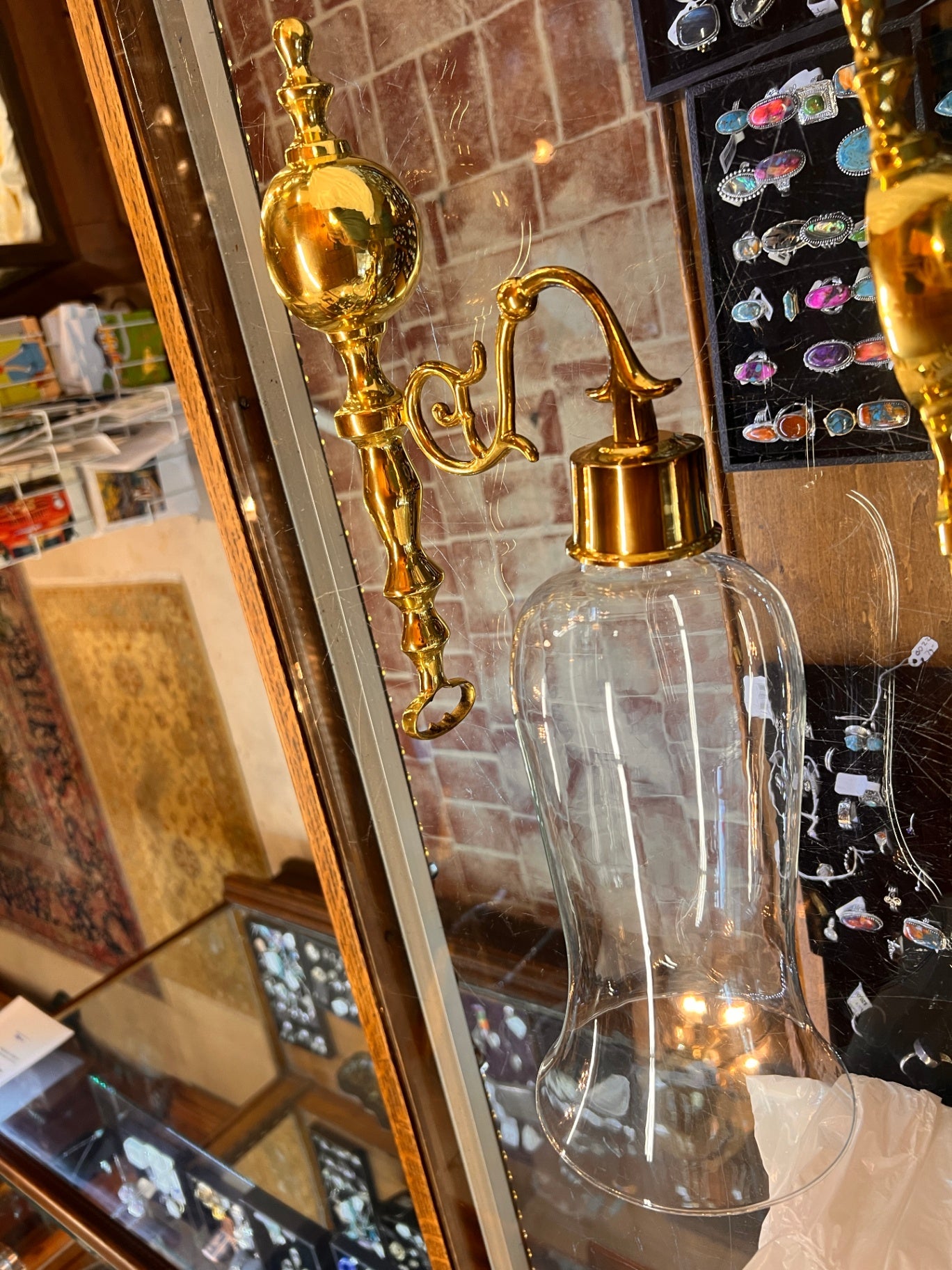 Polished Brass Wall-Mounted Hurricane Candle Sconce with Glass Chimney