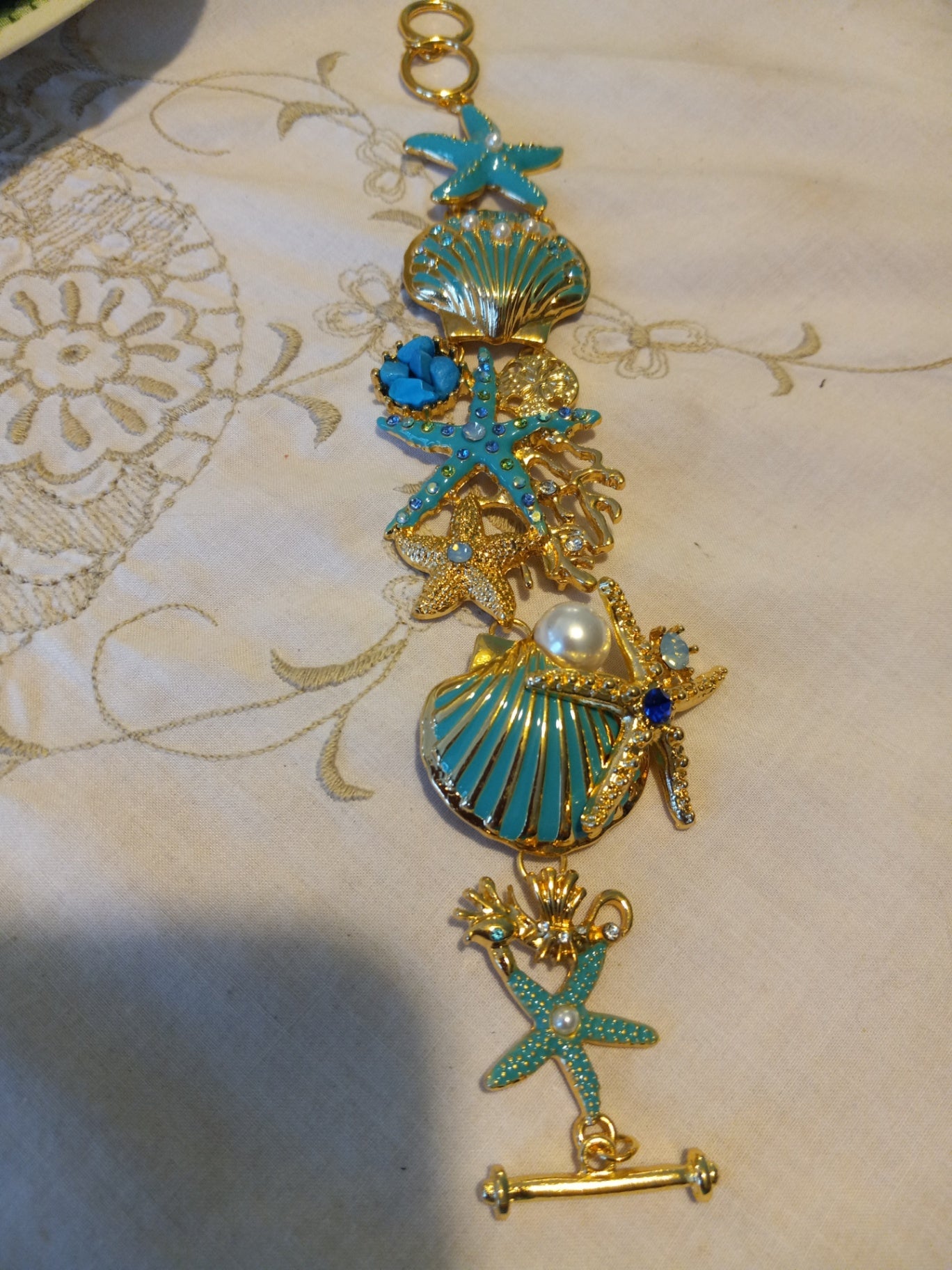 Teal starfish earrings n necklace dsc