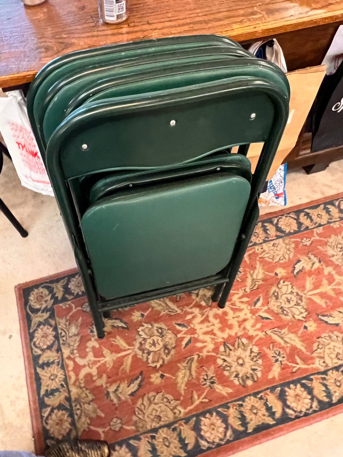 Four Green Folding Chairs