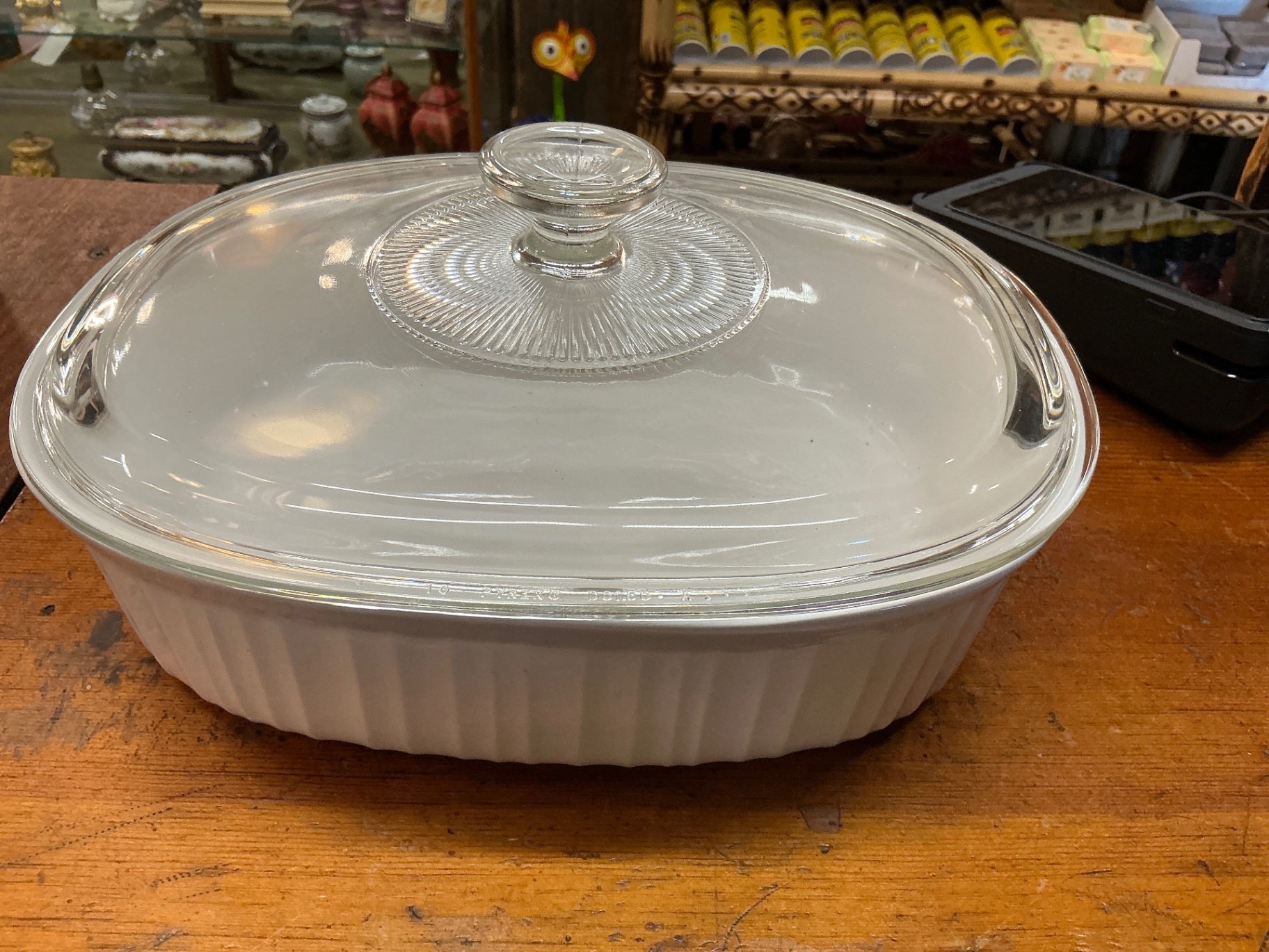 CorningWare French White oval casserole dish with a glass lid. 