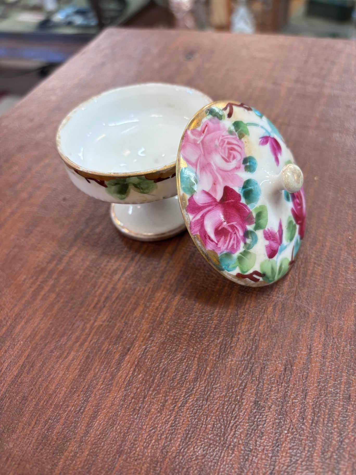 Small hand-painted porcelain trinket dish with a lid