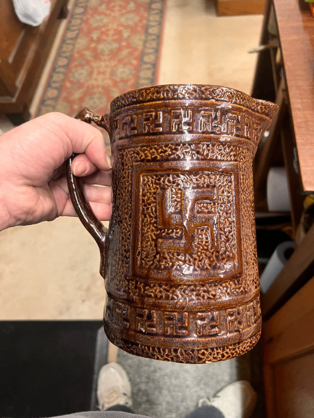 Antique Stoneware Pitcher or Stein c.1900–1925 – Textured Brown Glaze with Good Luck Swastika Motif
