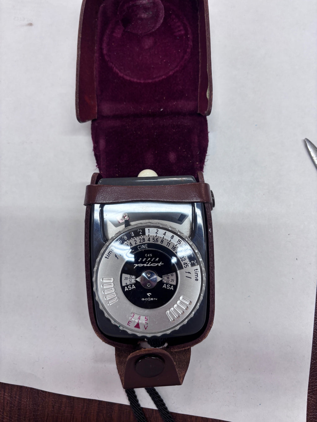Gossen Super Pilot or Sixtar CdS light meter with its original leather case