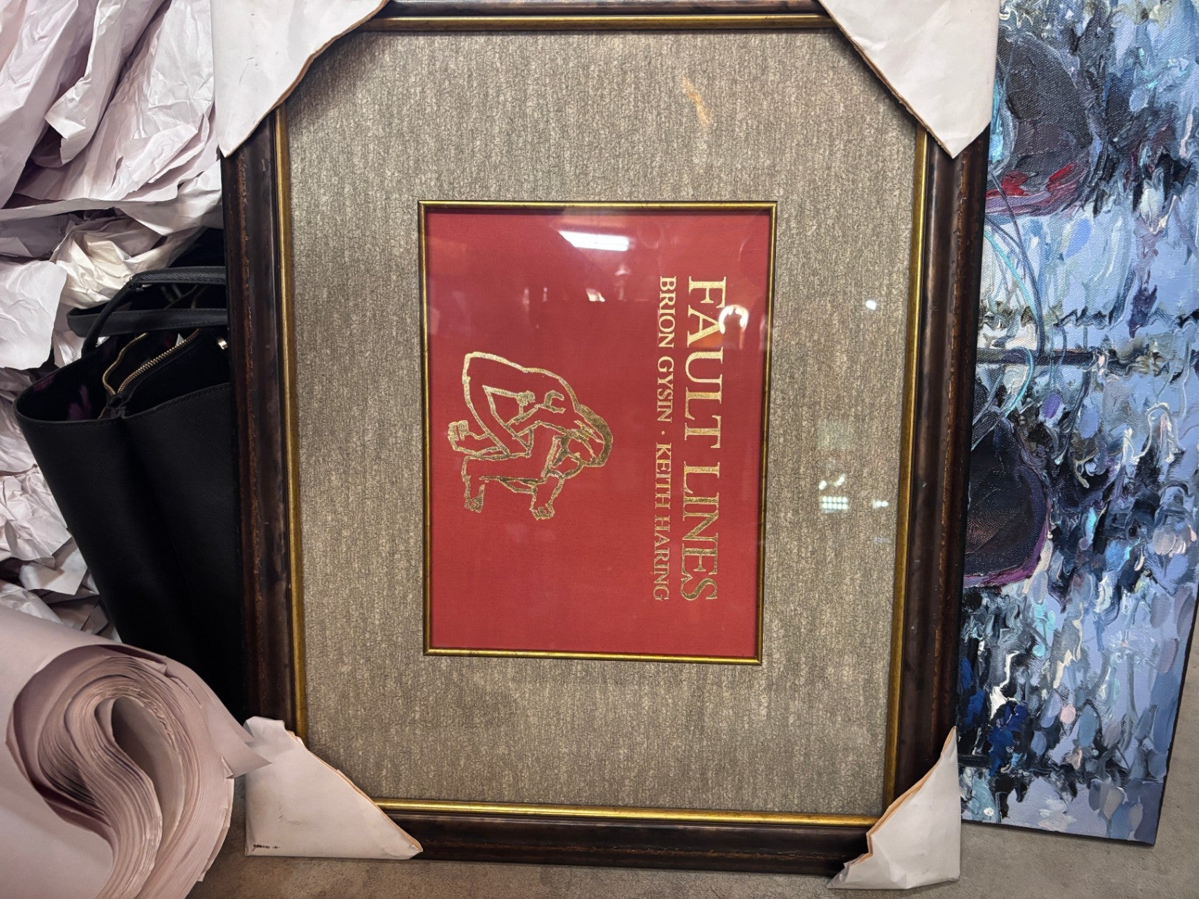 Framed print of art piece titled "Fault Lines," a collaboration between artist Brion Gysin and Keith Haring.